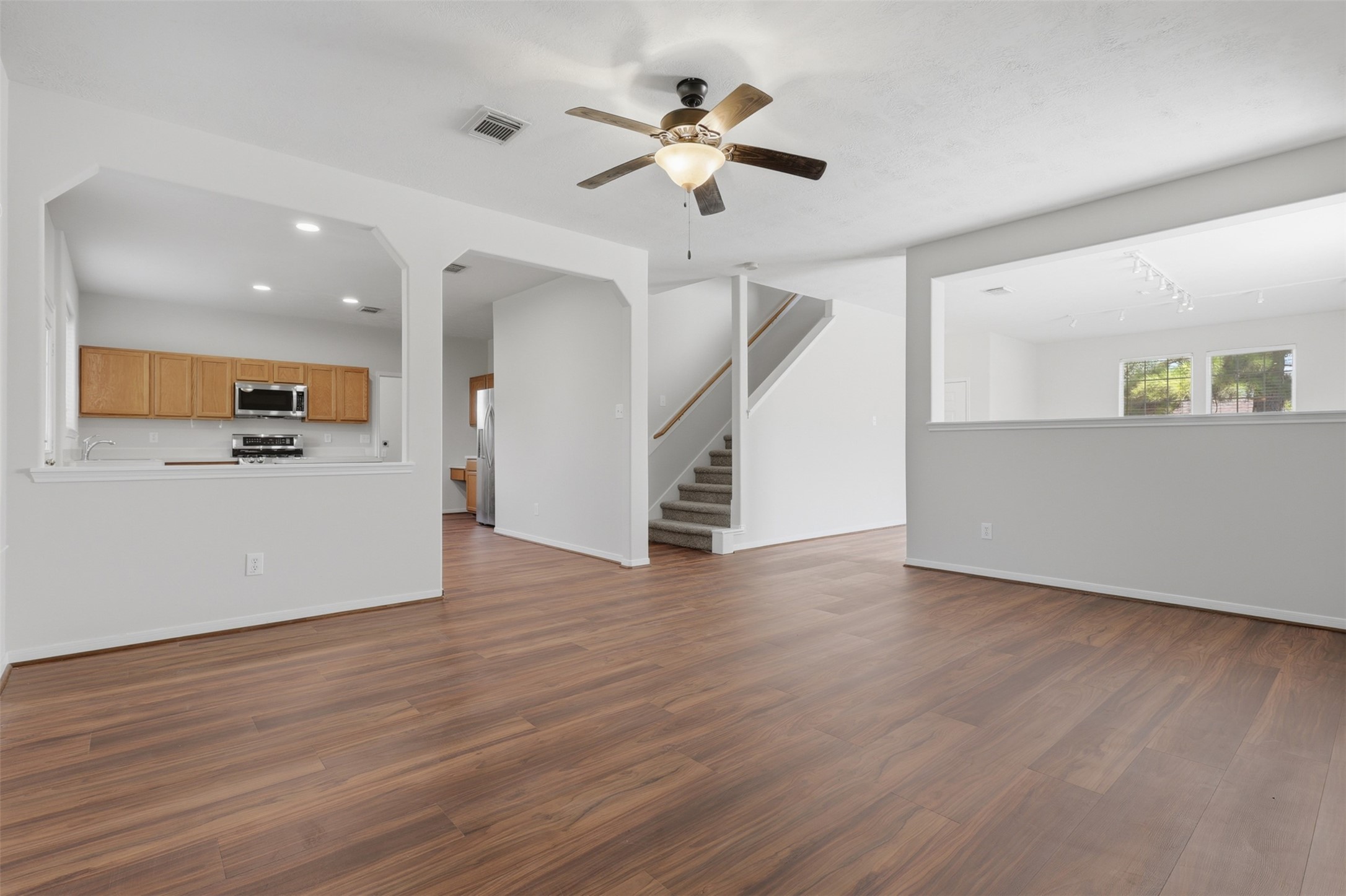 Ideally positioned just off the kitchen and breakfast area, this spacious gathering space offers an open, connected layout with views overlooking the backyardperfect for everyday living and entertaining.