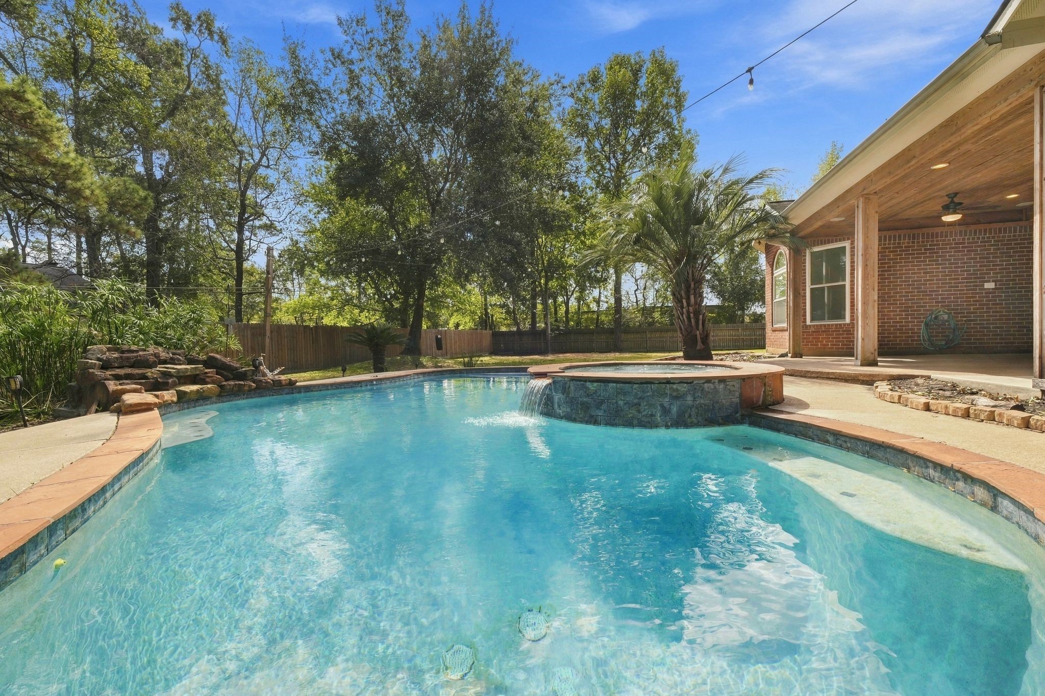 Another look at this pool with a peek to the right of the covered patio!