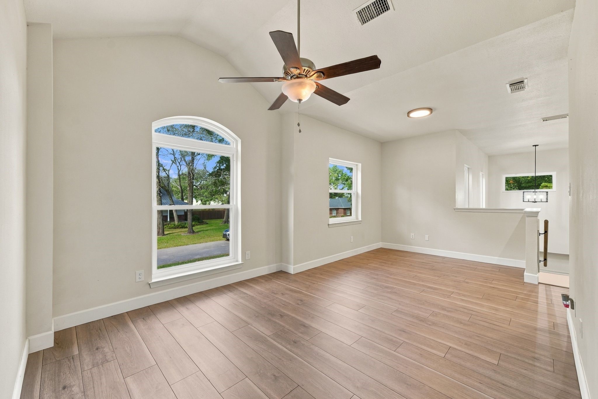 Another view of this great game room with updated flooring and lighting.