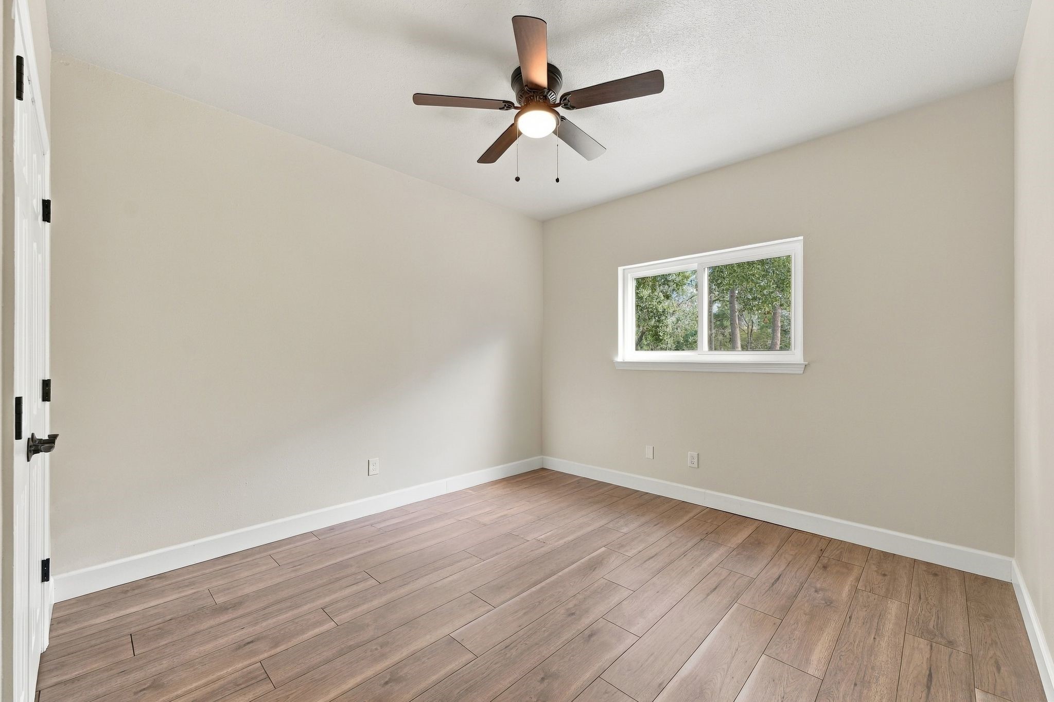 This is bedroom number 4- the third secondary bedroom upstairs. It also has updated flooring and lighitng.