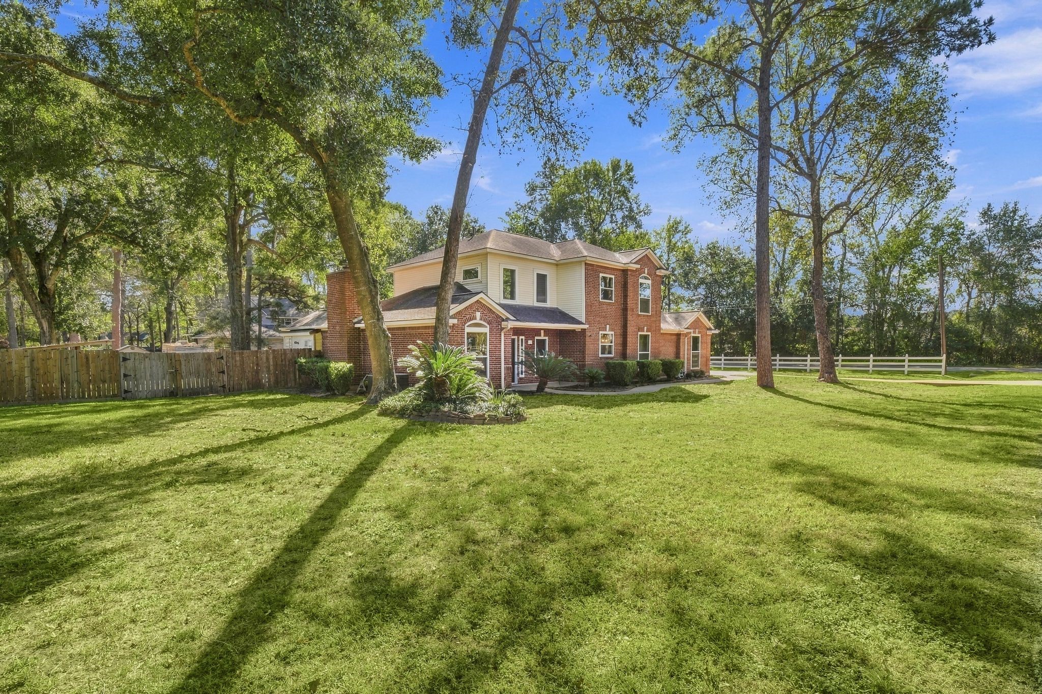 Set on an approximate half acre lot with a gorgeous pool and outdoor kitchen!