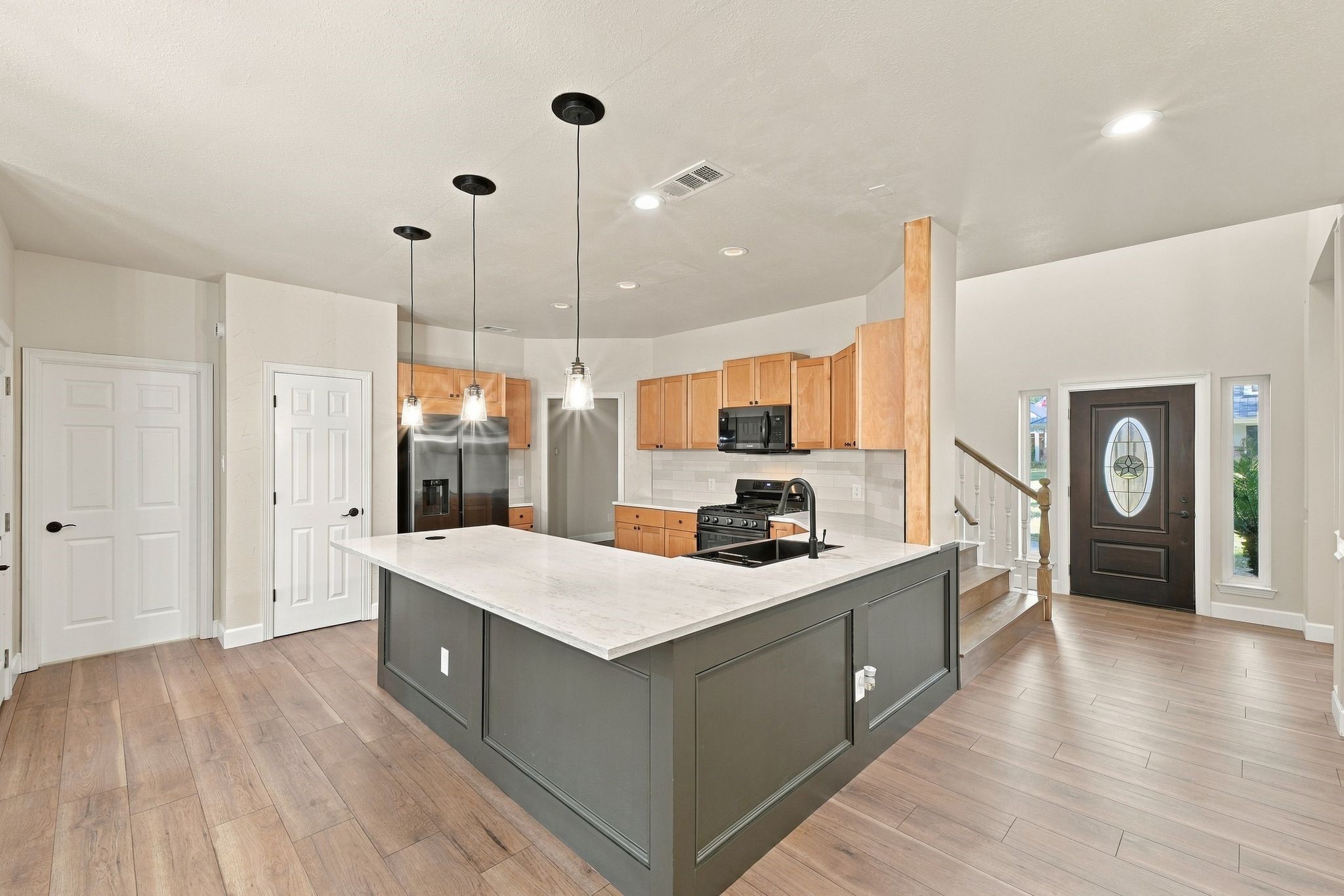 What a great open floor plan! You can see how open it is all the way to the entry way!