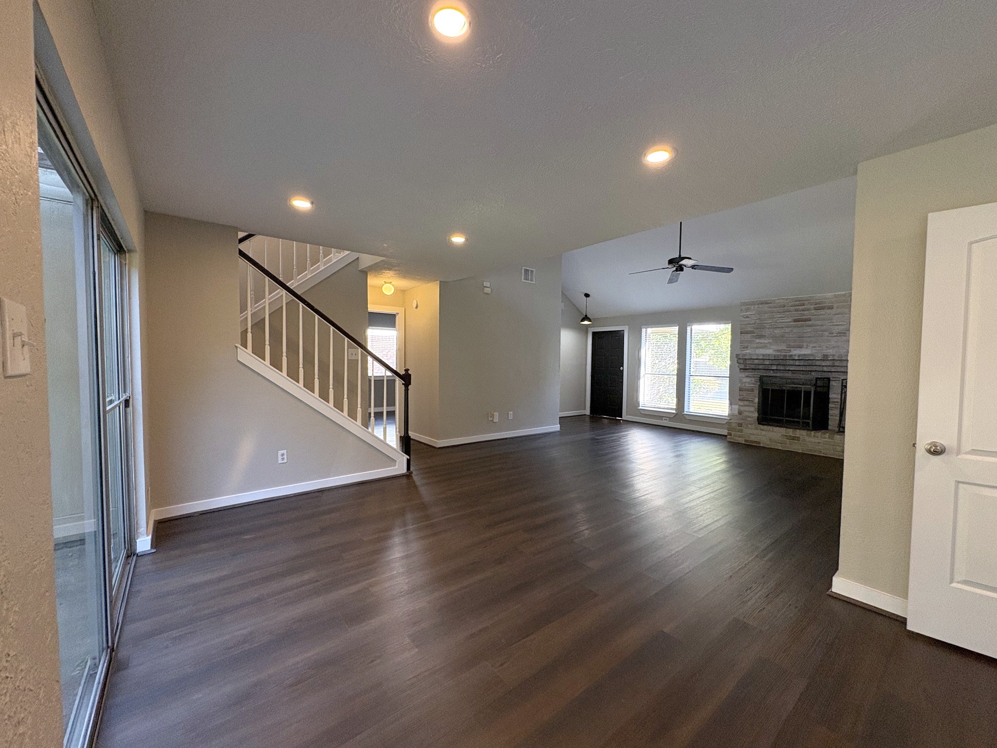 Looking from the breakfast bar toward the living area and front door