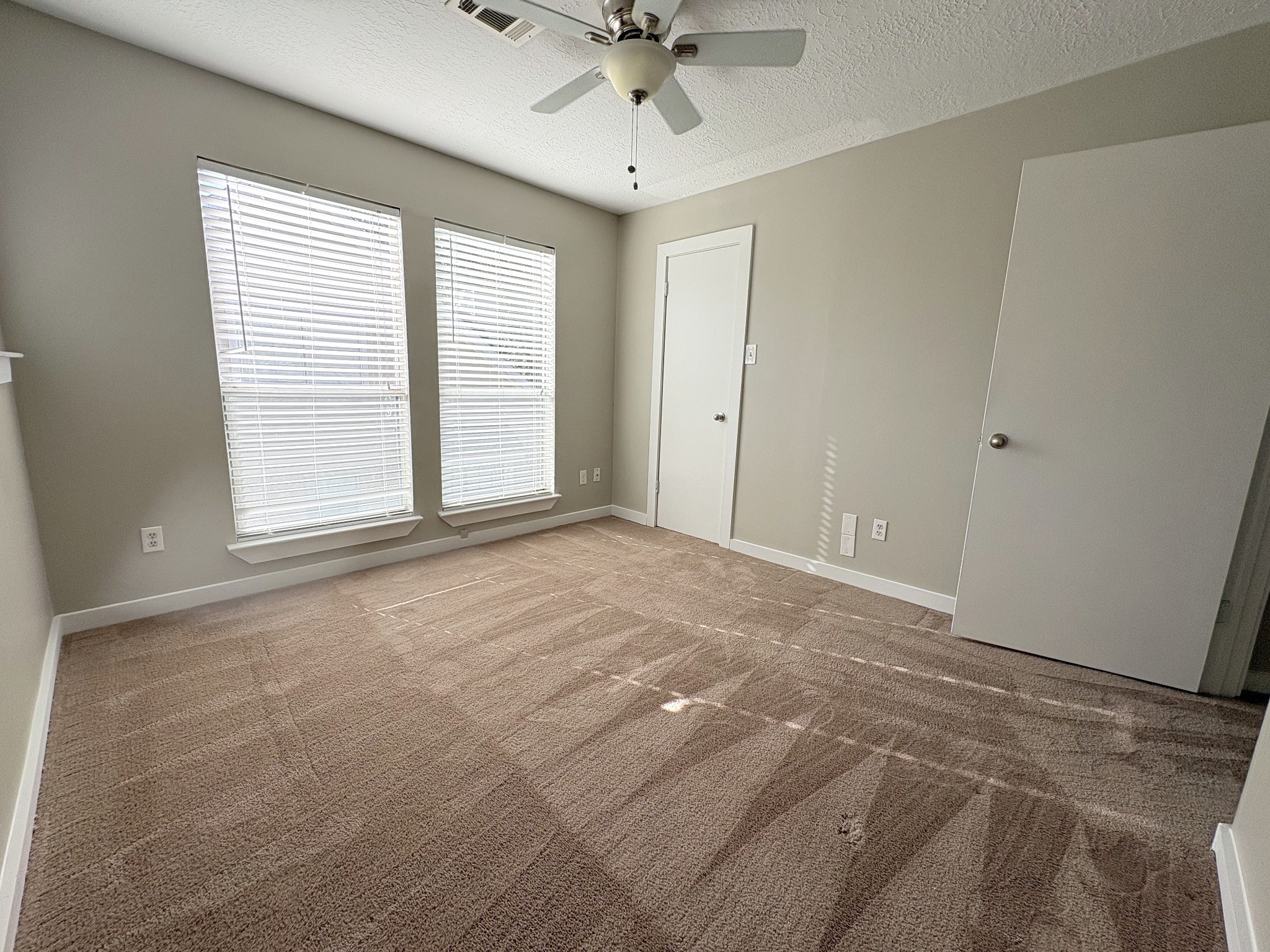 Bedroom 4 is tucked into the front corner upstairs