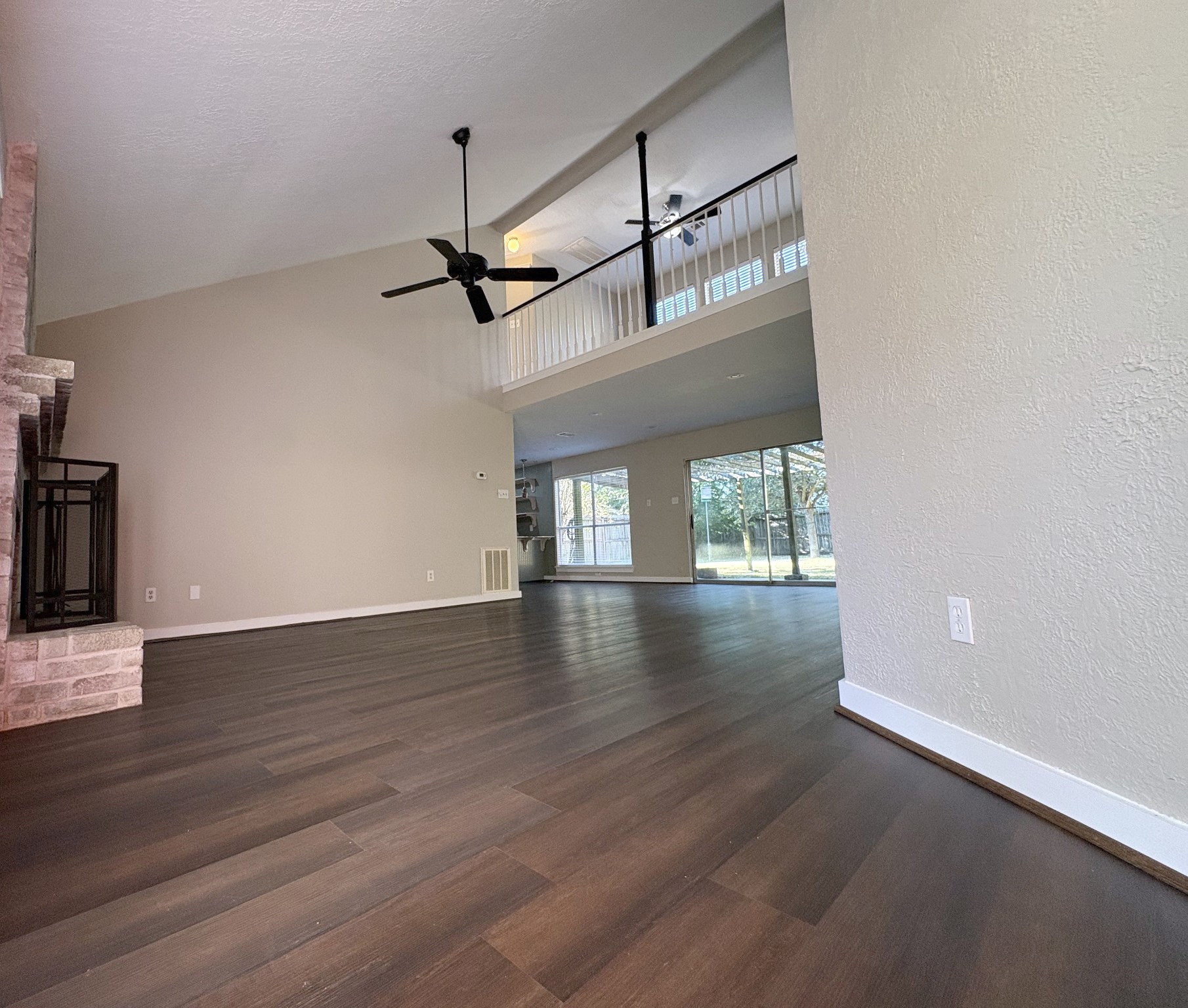 Step into this soaring open living space filled with natural light