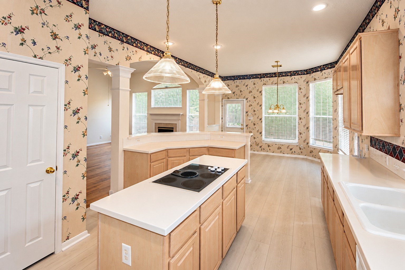 Another view of the island kitchen and breakfast area