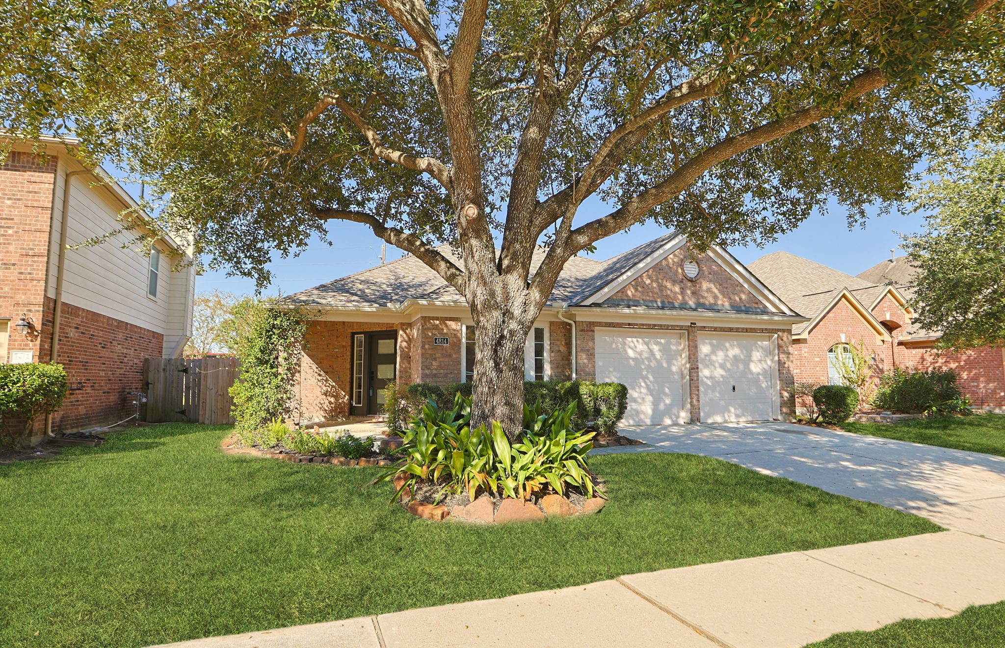 Neighborhood has mature trees and sidewalks for peaceful nights out walking or visiting with neighbors.