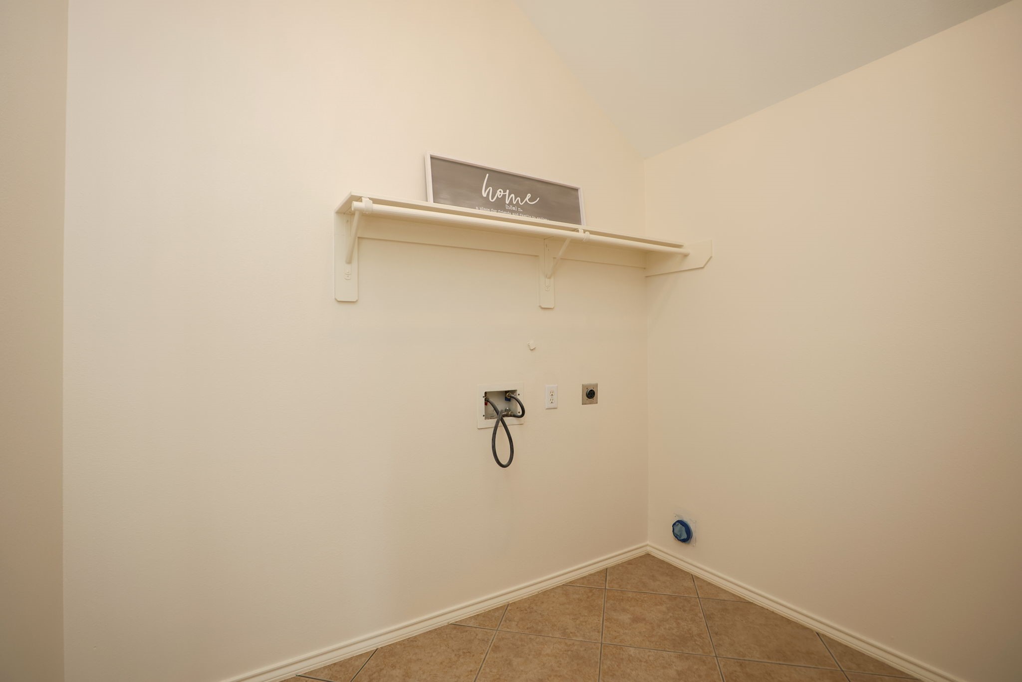 Laundry room with accommodate a full-size washer and dryer PLUS a refrigerator!