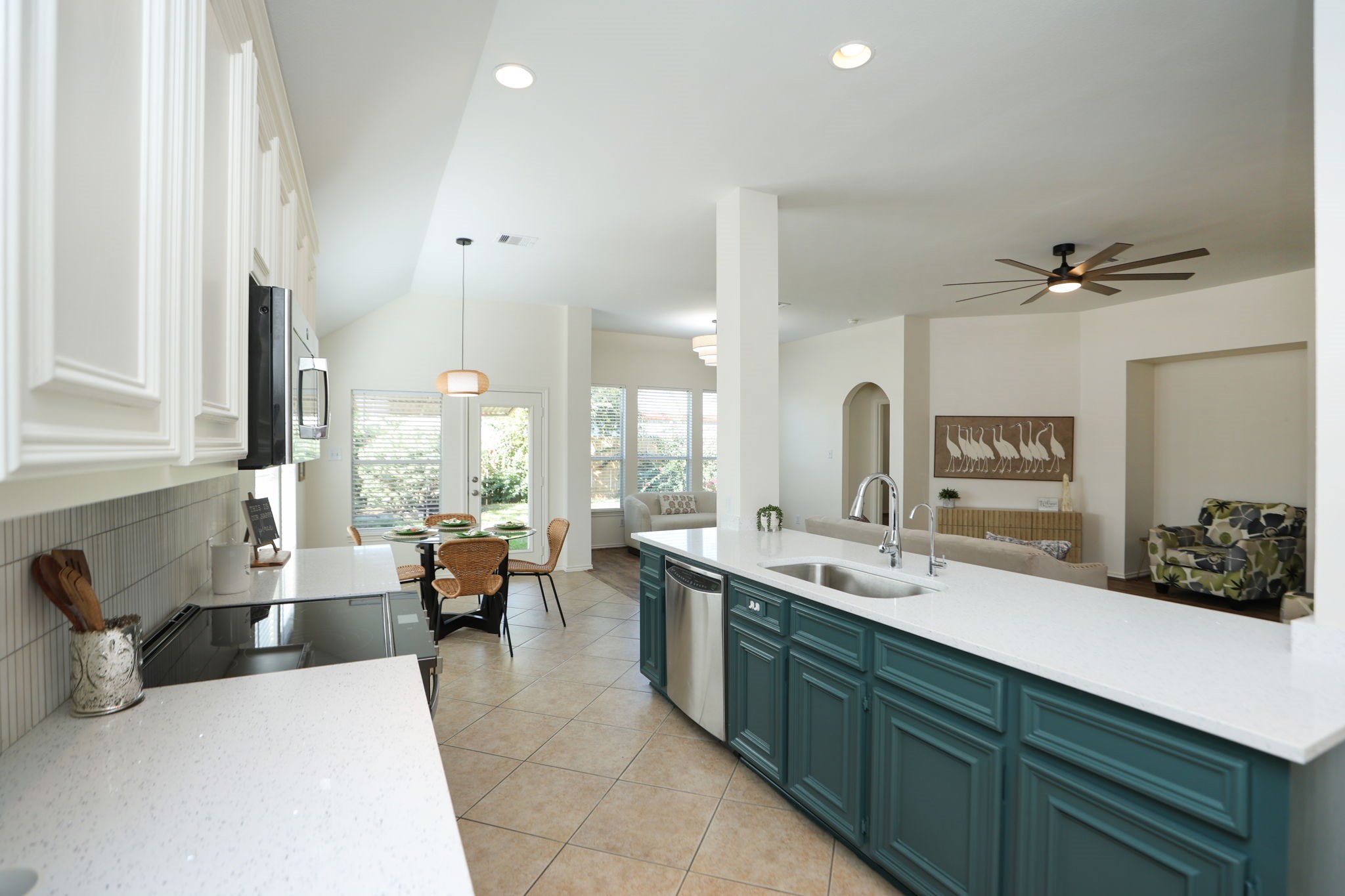 Spend time in your kitchen AND with your loved ones in this open concept main living area!