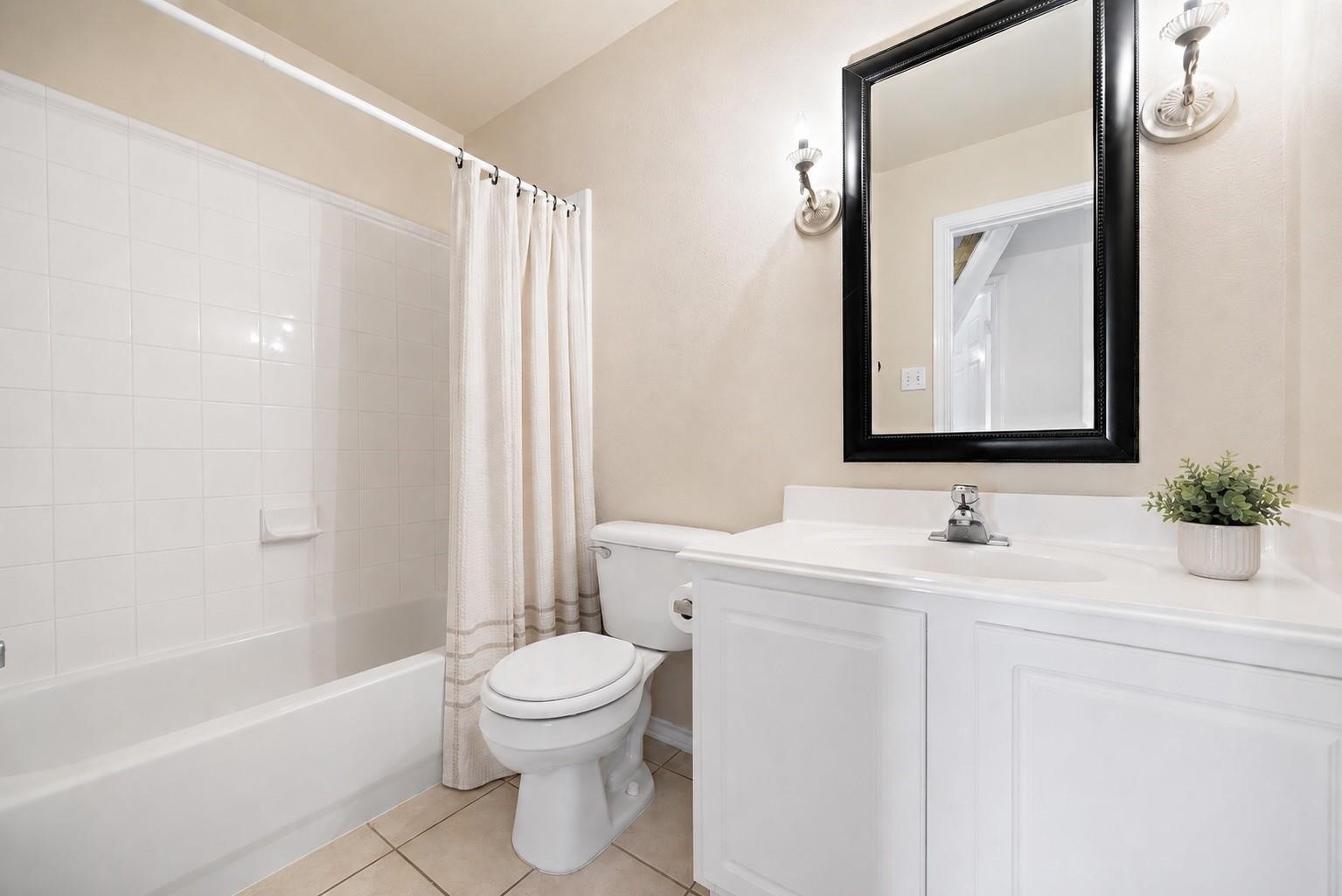 Hall bath located right outside of the secondary bedrooms.