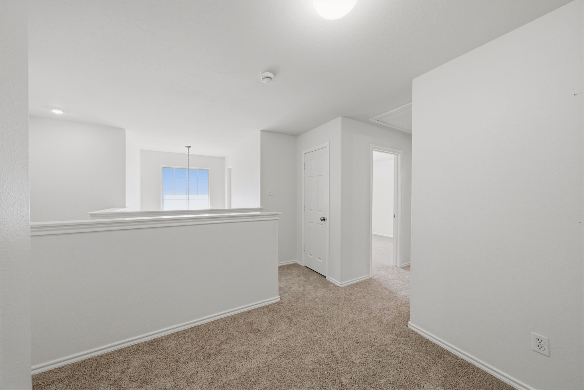Loft located between the bedrooms at the top of the stairs.