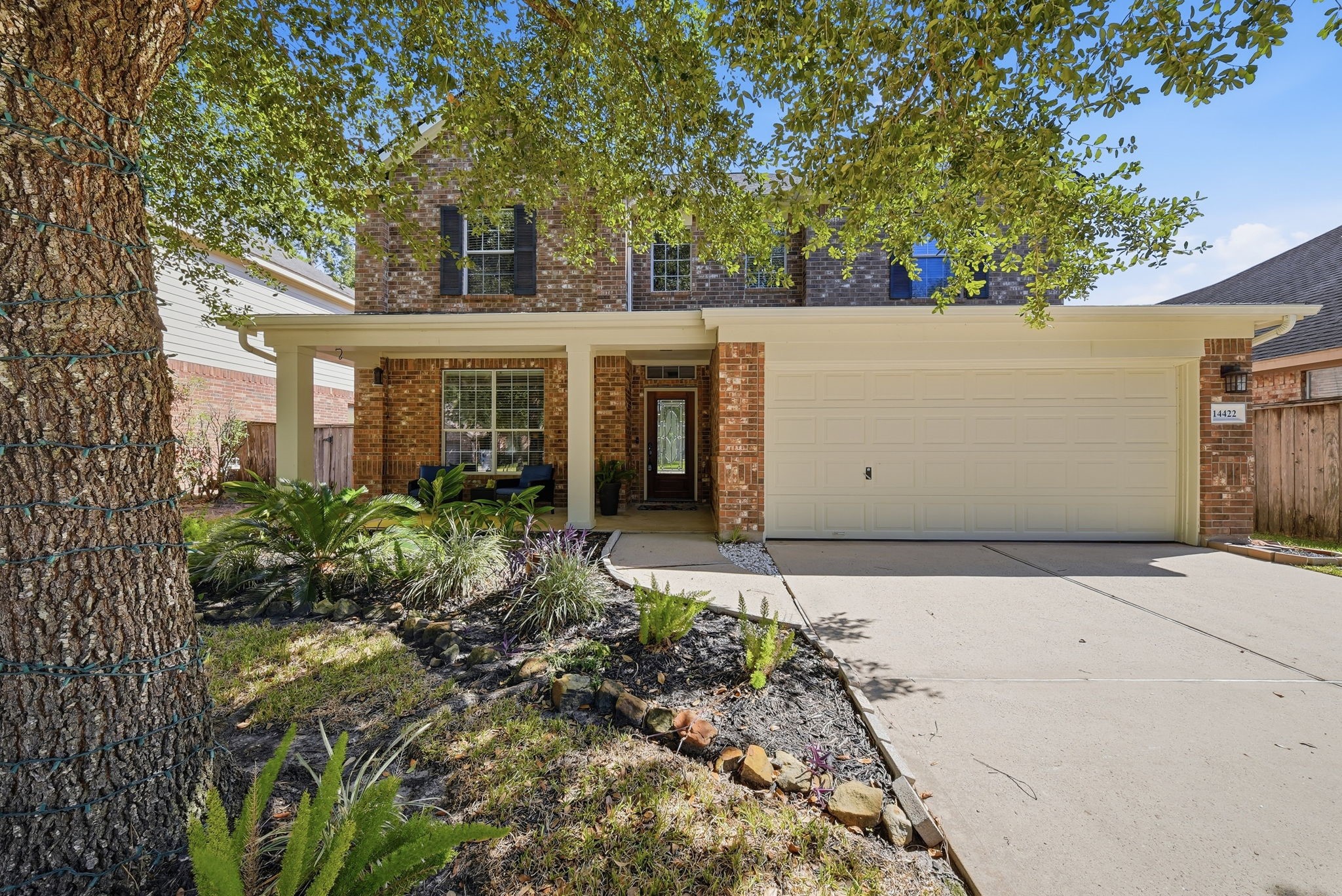 Welcome home! This two-story brick home offers 4 bedrooms, 2.5 bathrooms, an upstairs game room, and a covered front porch framed by mature trees.