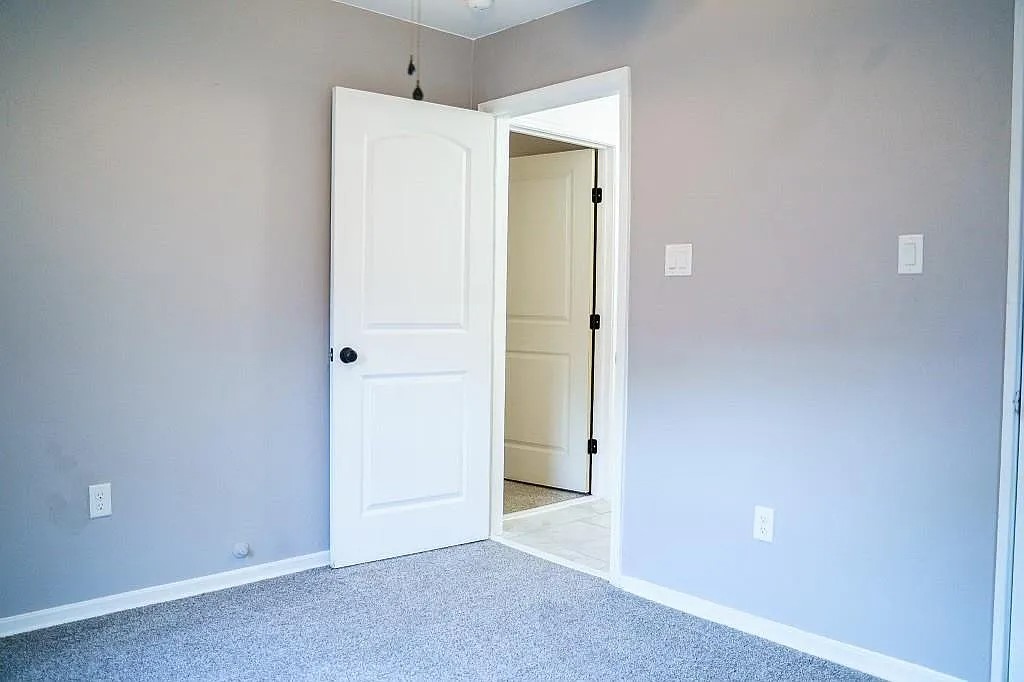 Interior Hallway with Fresh Paint and Wood-Look Flooring