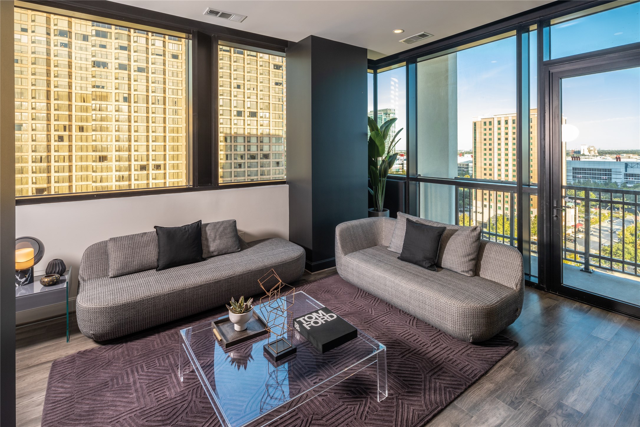 [Living Area VIRTUALLY STAGED] Expansive walls of windows radiate abundant light.... you will relish the sunrises !