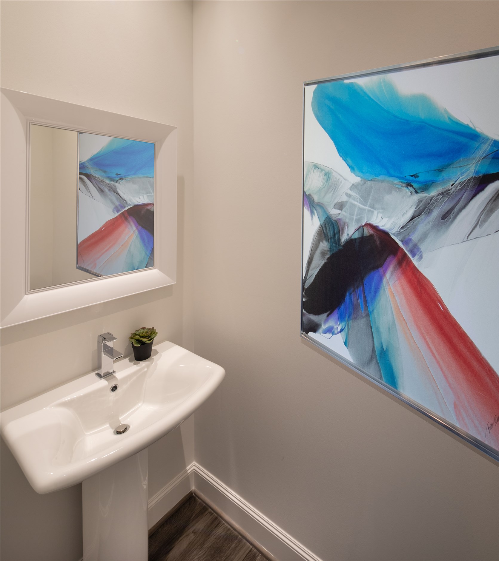 [Powder Room] Conveniently and privately located in foyer, with pedestal sink