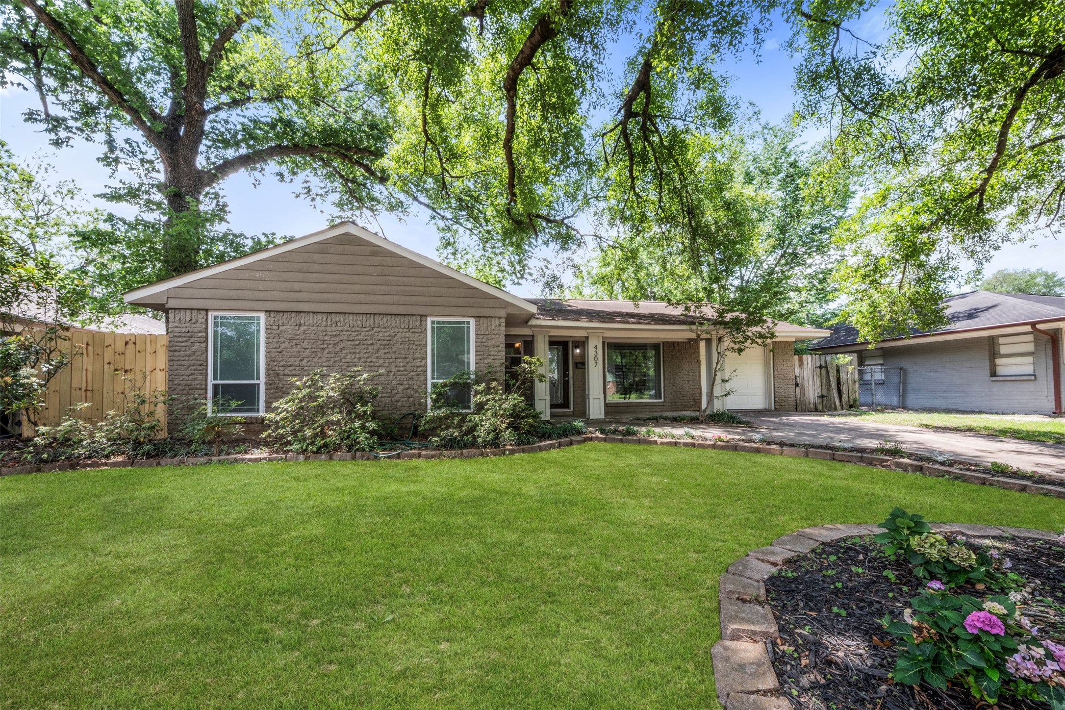 If you love having a flower bed, there is plenty of space to do so in this yard.
