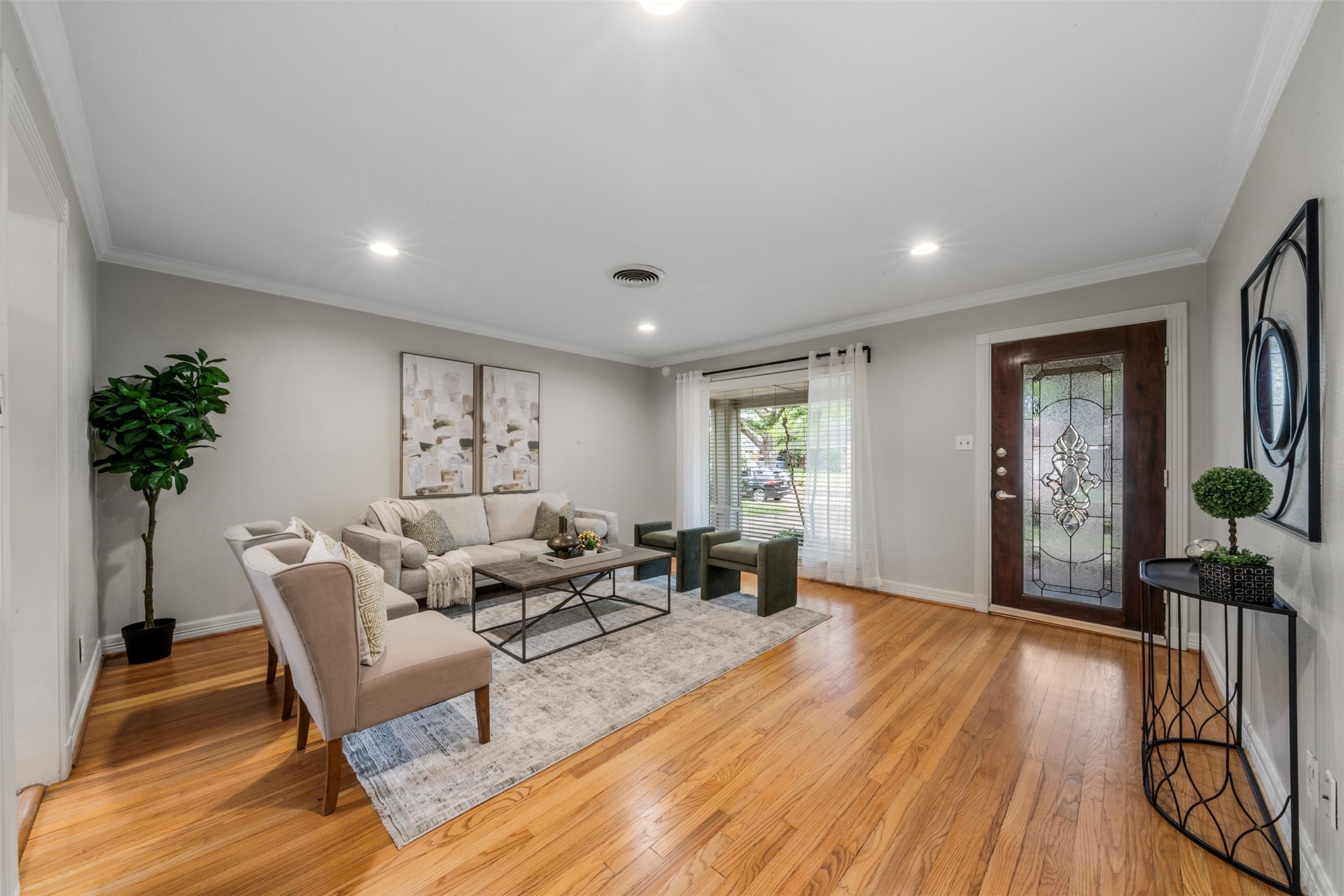 Original hardwood floors that have been refinished, and fresh paint welcomes you throughout the home.