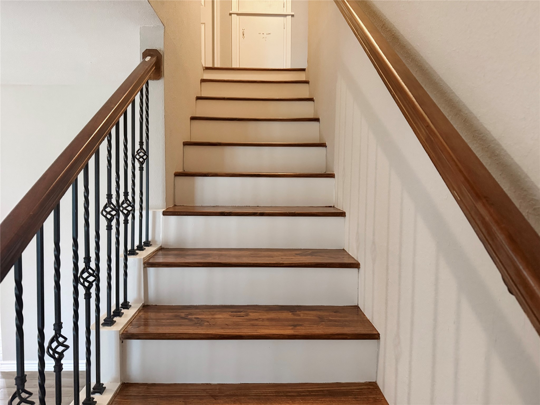 Staircase conveniently located near the front entry provides easy access to the second floor.