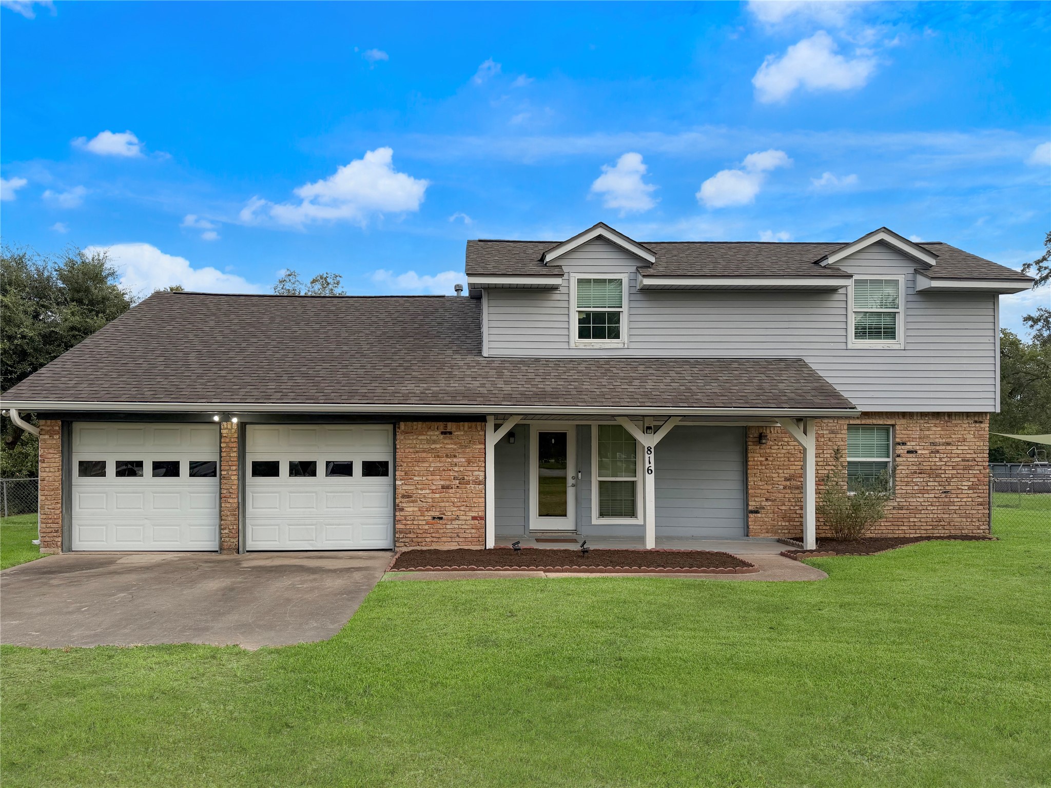 Attractive two-story home featuring a welcoming front entrance and classic exterior design. Spacious layout offers two levels of living space with inviting curb appeal. Attractive two-story home featuring a welcoming front entrance and classic exterior design. Spacious layout offers two levels of living space with inviting curb appeal.