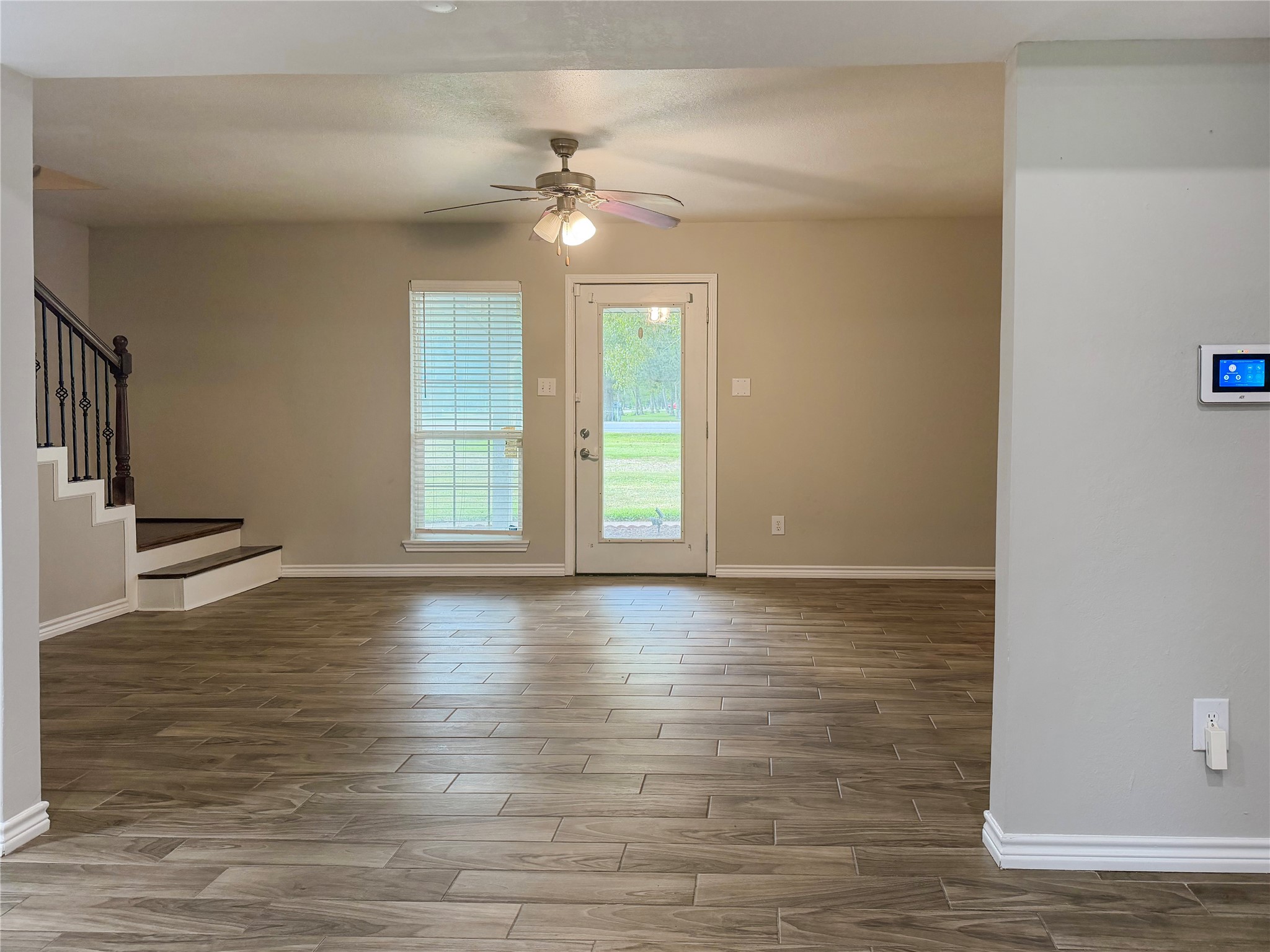 Front entry opens directly into the living room, creating a welcoming space for relaxing or entertaining.