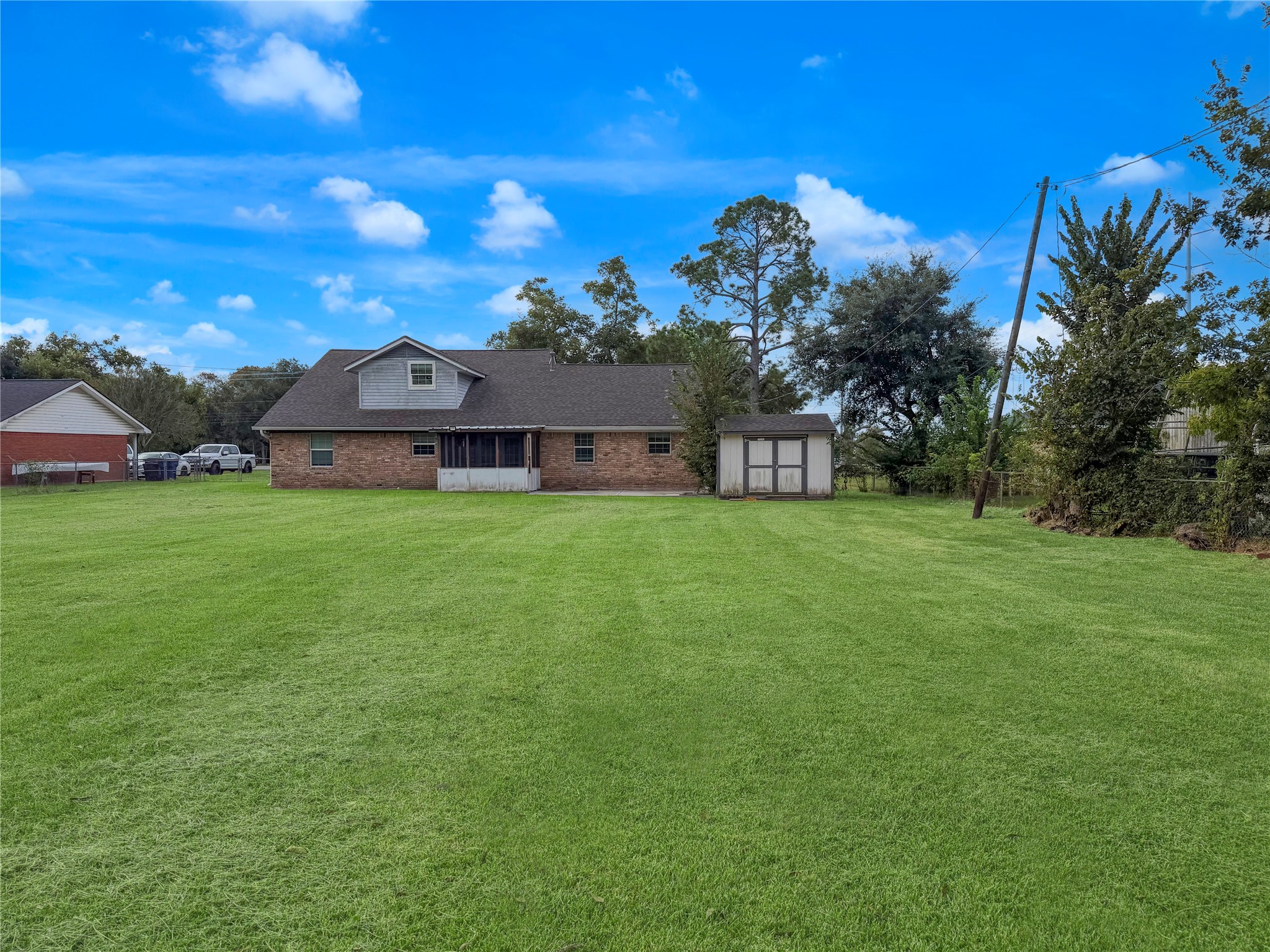 Spacious backyard offering plenty of room for outdoor activities, entertaining, gardening, or creating your own outdoor retreat.