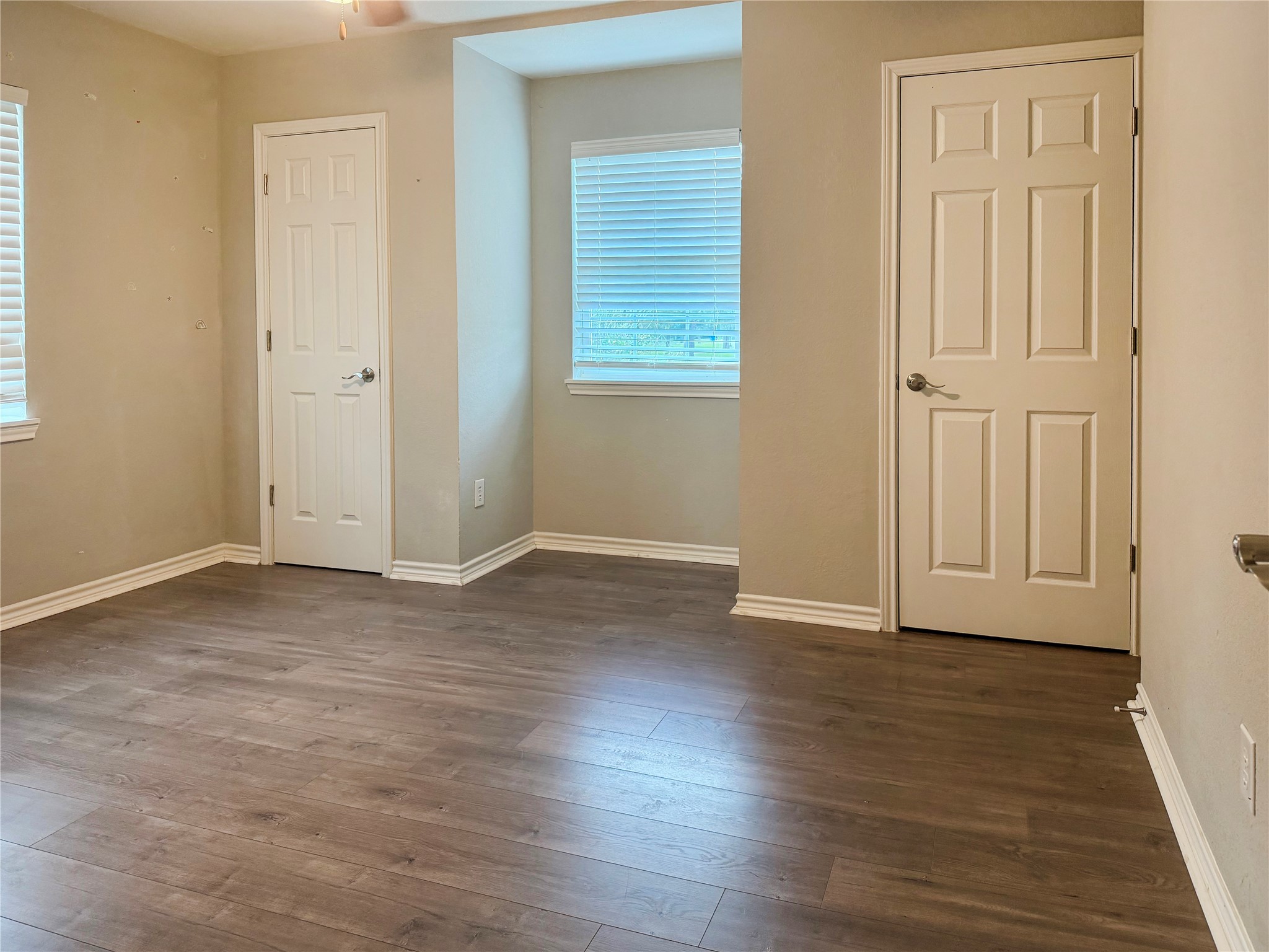 Two additional bedrooms located upstairs, offering comfortable spaces with flexibility for a variety of uses.