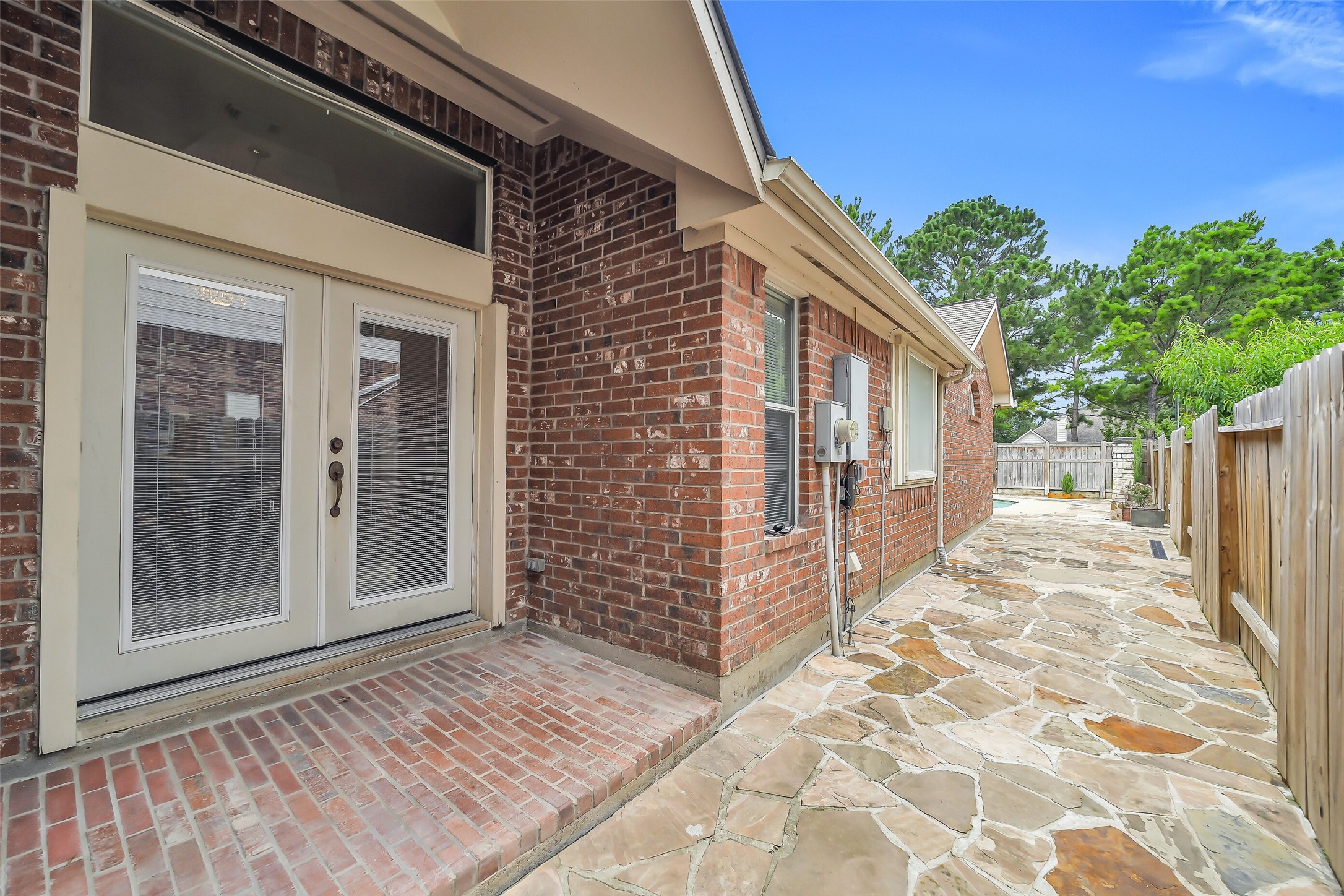 This side patio is perfect for your morning coffee.