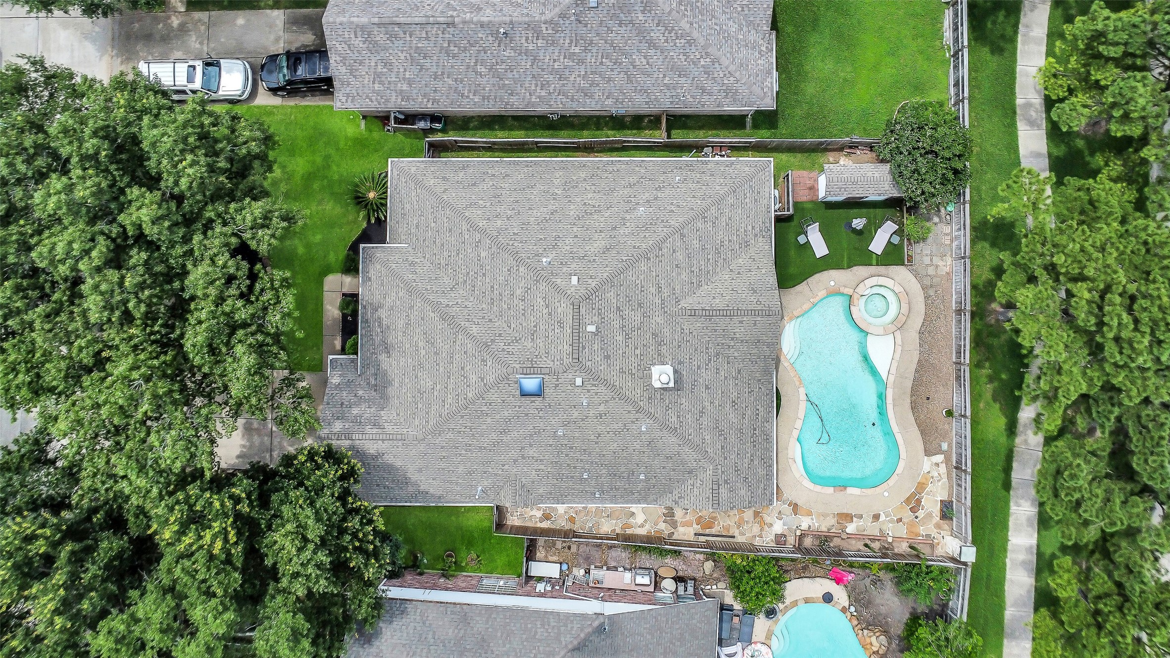 Backyard oasis with pool and spa.
