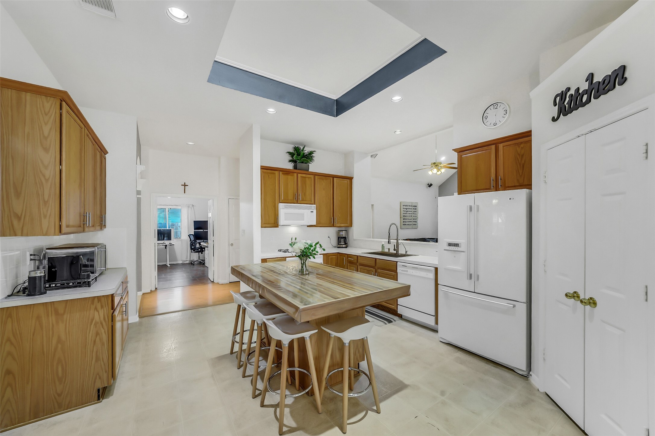 Kitchen with modern appliances, perfect for cooking and entertaining and offers easy access to the formal dining.