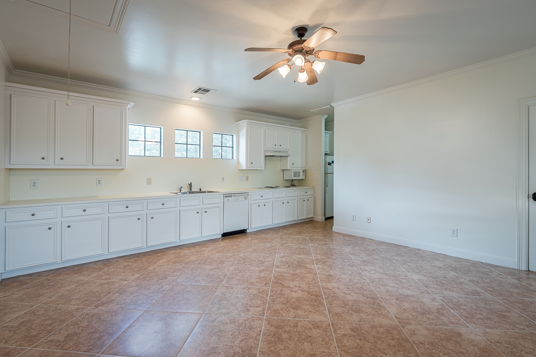 Above-garage guest apartment with a full bathroom and kitchen.