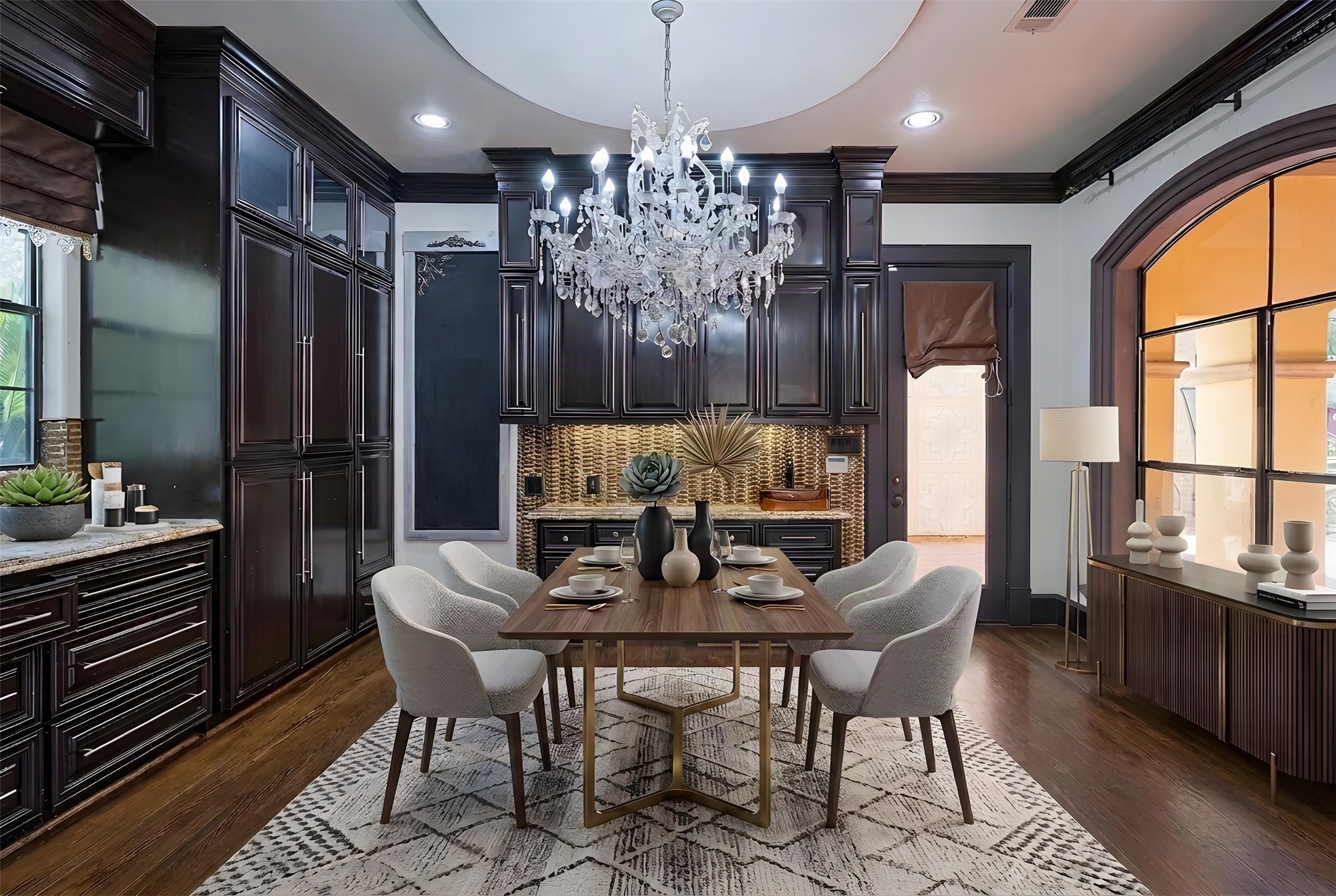 Breakfast room off of the Kitchen surrounded by windows provides the perfect morning atmosphere to start the day.