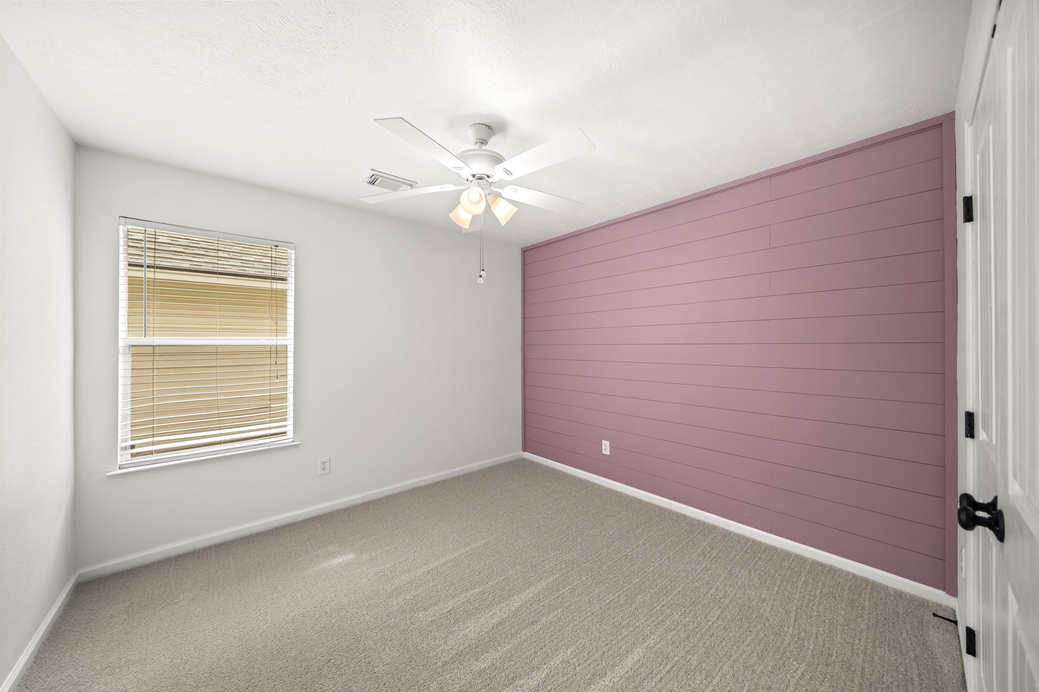 Secondary Bedroom with Beatiful accent wall