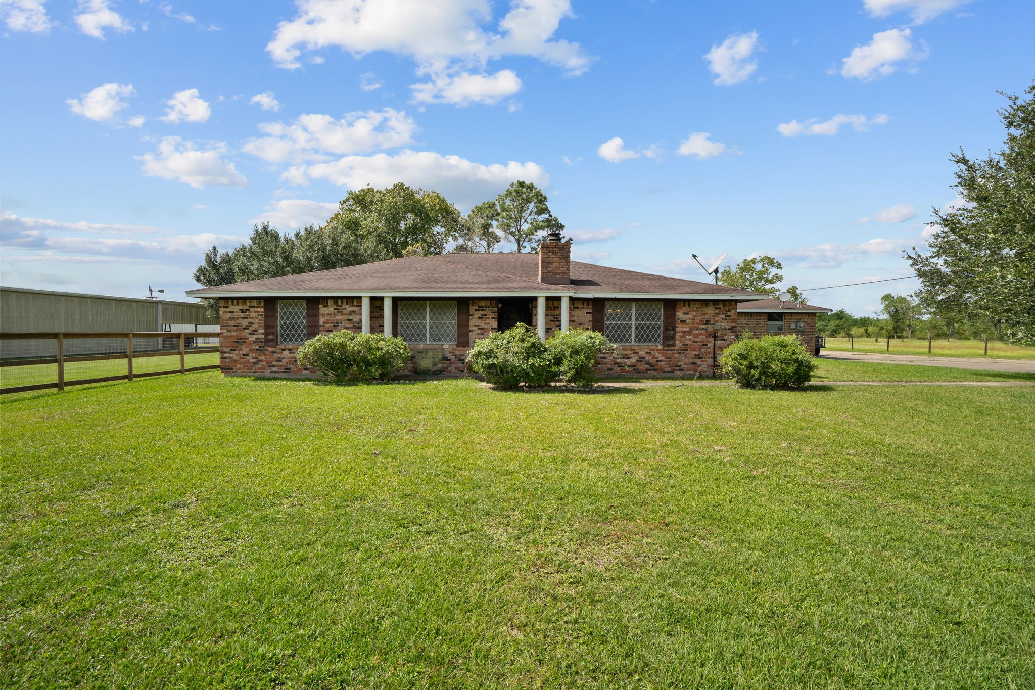 Brick home situated on 5 acres with mature trees and open green space. Brick home situated on 5 acres with mature trees and open green space.