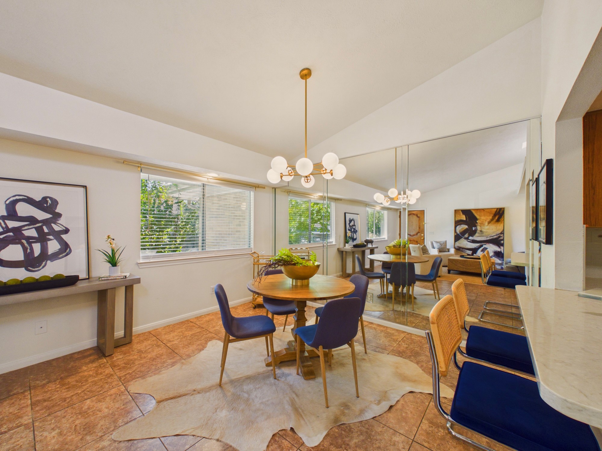 Mirrored Wall in the Dining Area Makes the Space Feel Twice as Large and Bright! Mirrored Wall in the Dining Area Makes the Space Feel Twice as Large and Bright!