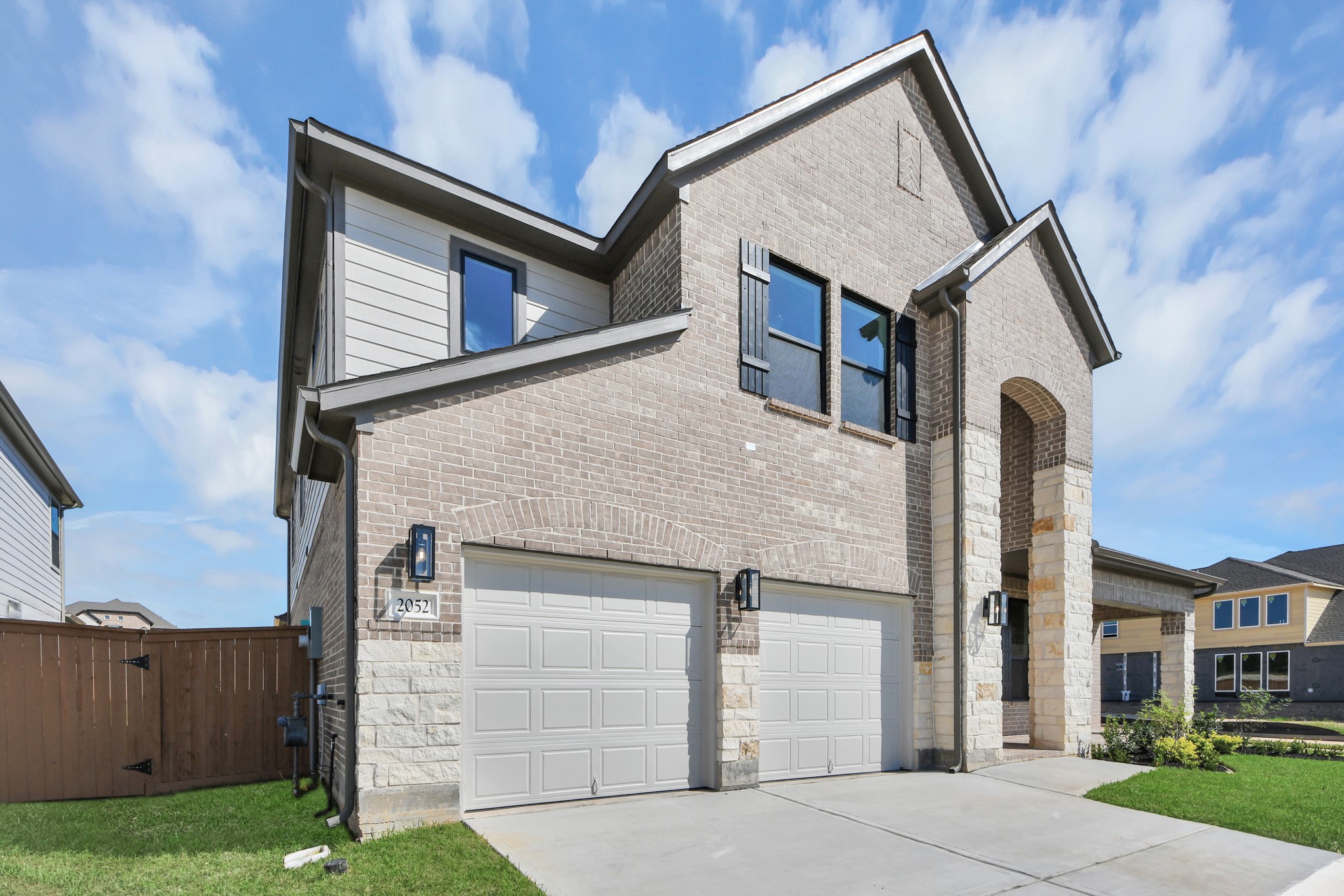 Home features a convenient 2-car garage complemented by a spacious driveway, offering ample parking for you and your guests.