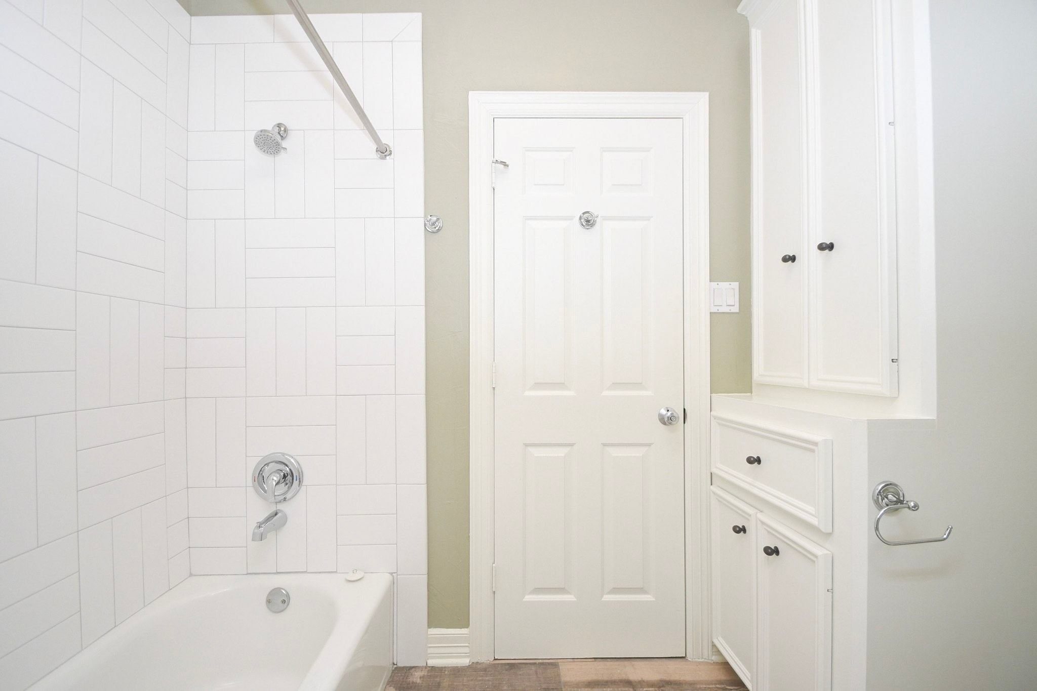 Full Bathroom - Beautifully renovated space featuring high-end modern fixtures, a sleek floating vanity with quartz countertops, and a spacious walk-in shower with designer tile work!