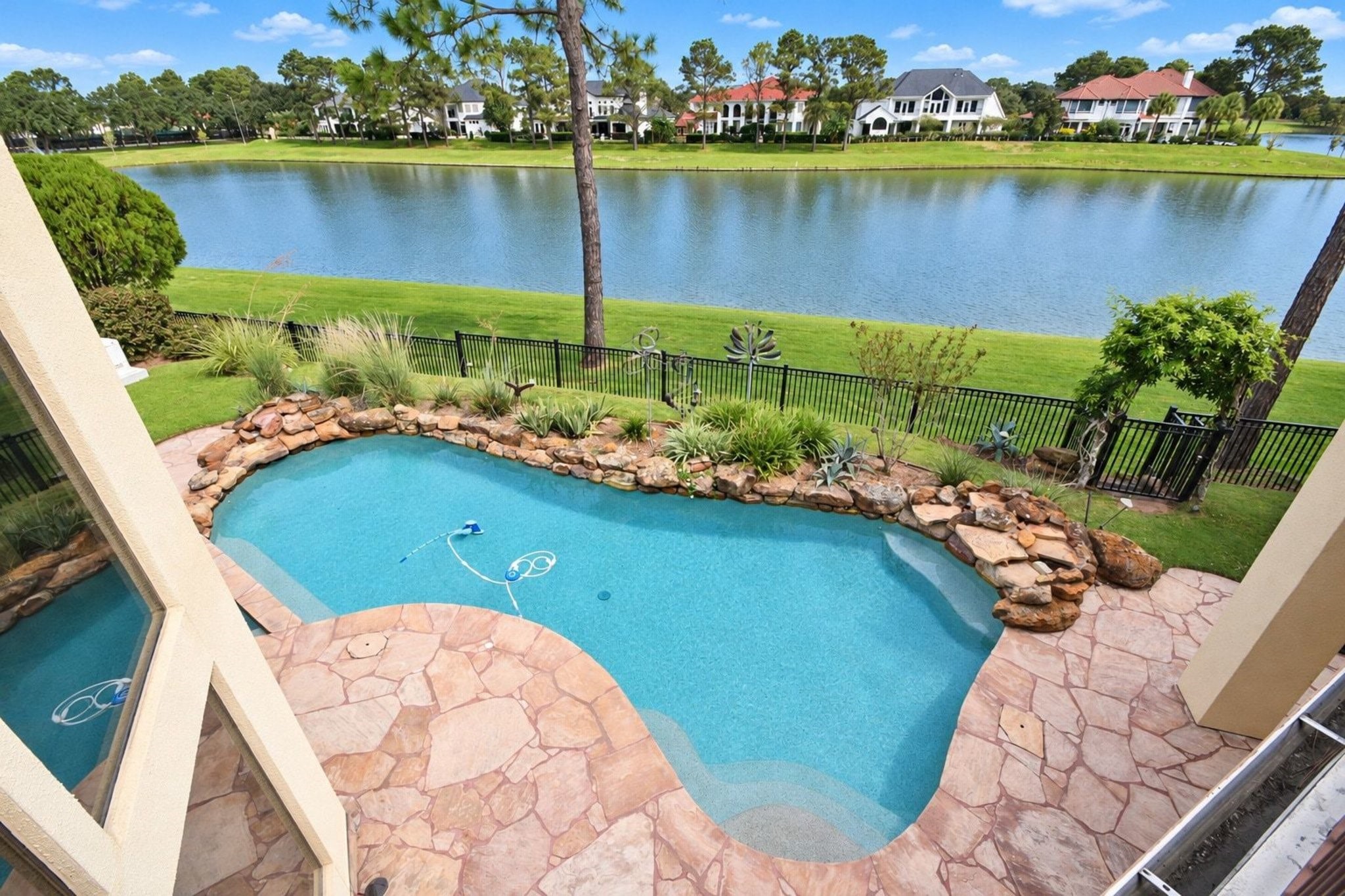 Experience ultimate relaxation on this private upstairs patio, which offers an expansive, breathtaking panoramic view that captures the beauty of the surrounding landscape perfectly. Whether you are enjoying your morning coffee or hosting an evening gathering, this elevated outdoor space serves as a stunning vantage point and a standout feature of the home, providing a serene retreat that truly enhances the propertys overall appeal to potential buyers!