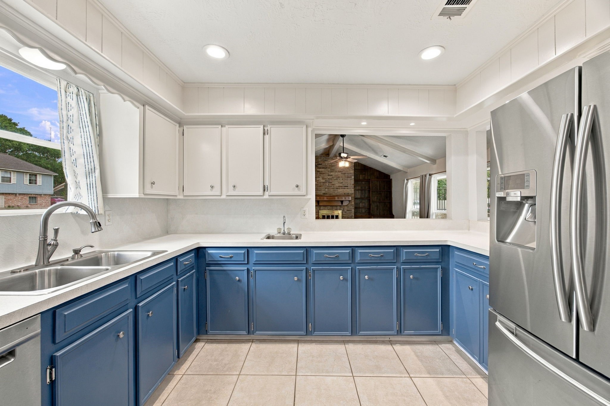 This light and bright kitchen is a cook's dream.  Plenty of space to cook and plenty of space to store all your equipment and serving pieces.