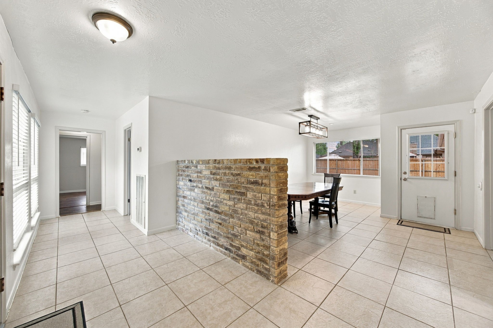 This home has a light and bright floor plan, with plenty of windows.  Even though it looks very private from the outside.
