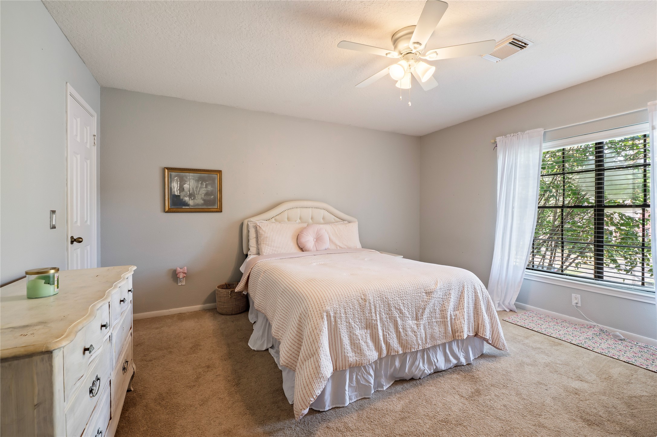 A bright bedroom with great natural light.