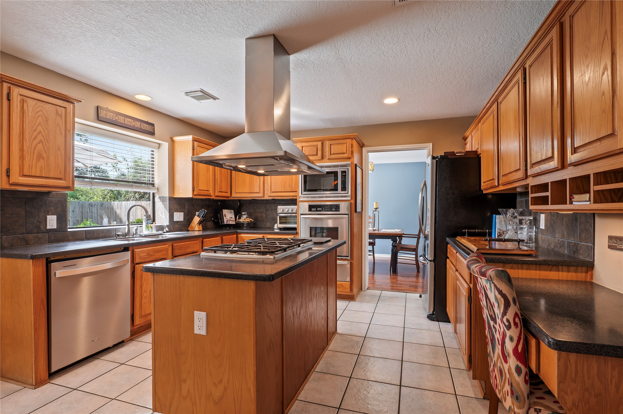Another view of the kitchen with easy access to the formal dining room.