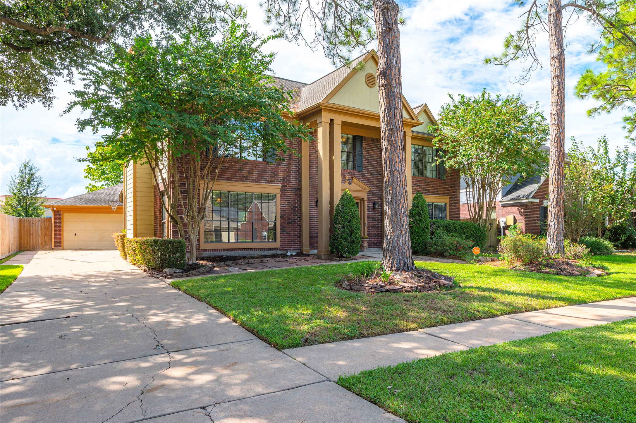 The extra-long driveway offers plenty of parking when entertaining.