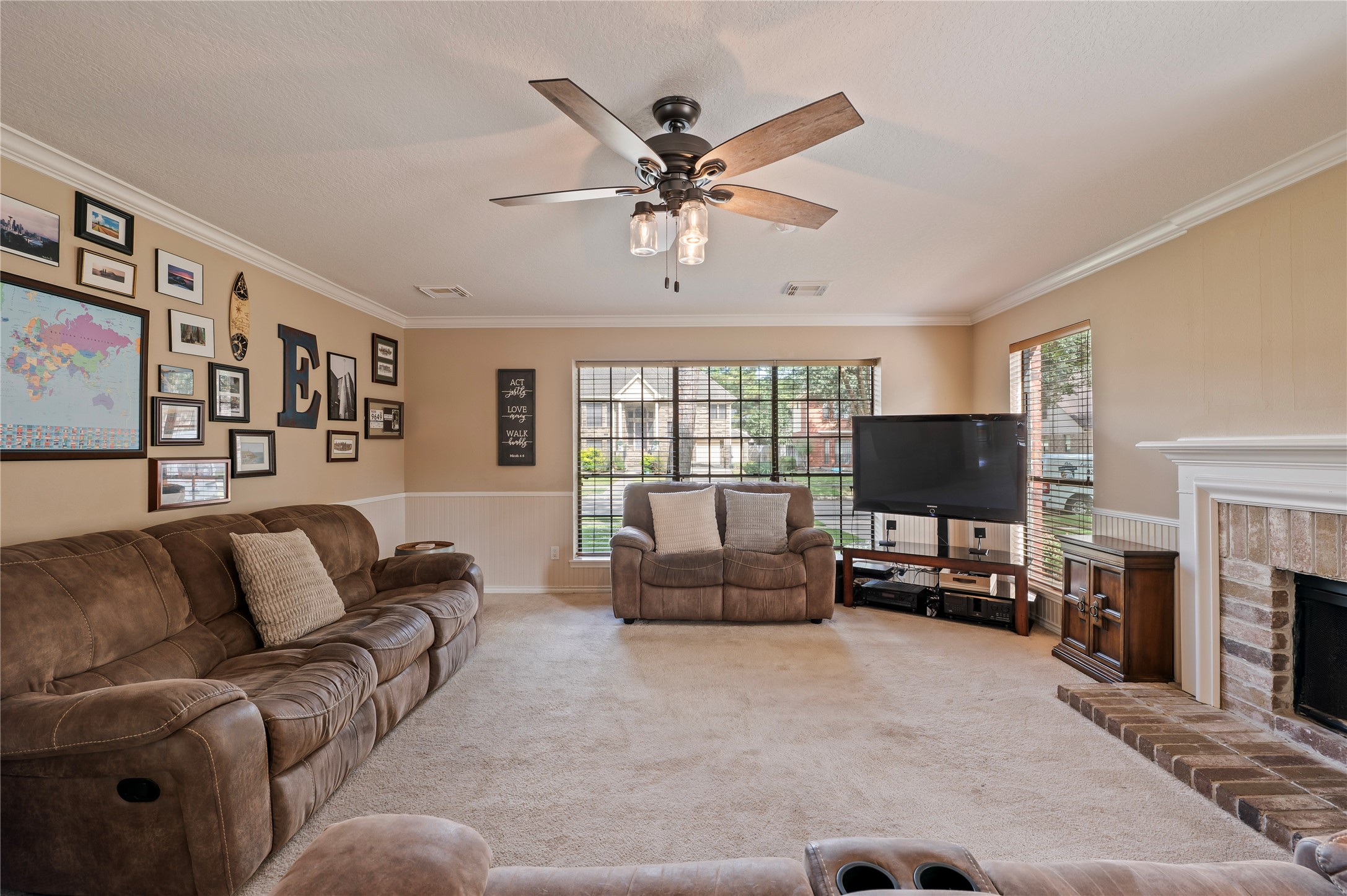 Plenty of room to gather, with crown molding and lots of natural light.
