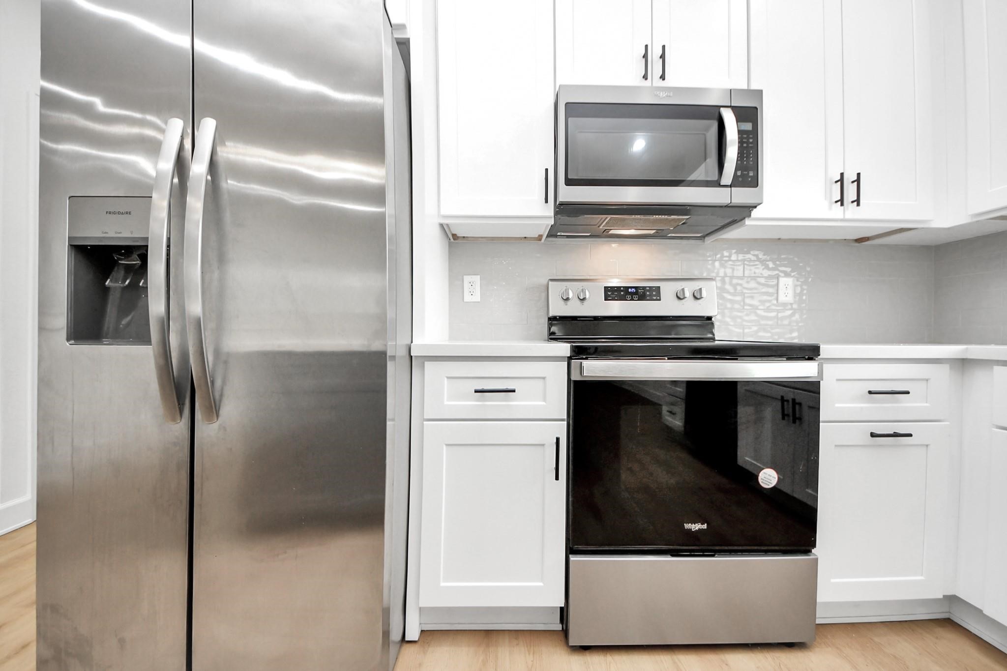 Stainless steel appliances pair perfectly with quartz counters and modern shaker cabinetry. Stainless steel appliances pair perfectly with quartz counters and modern shaker cabinetry.