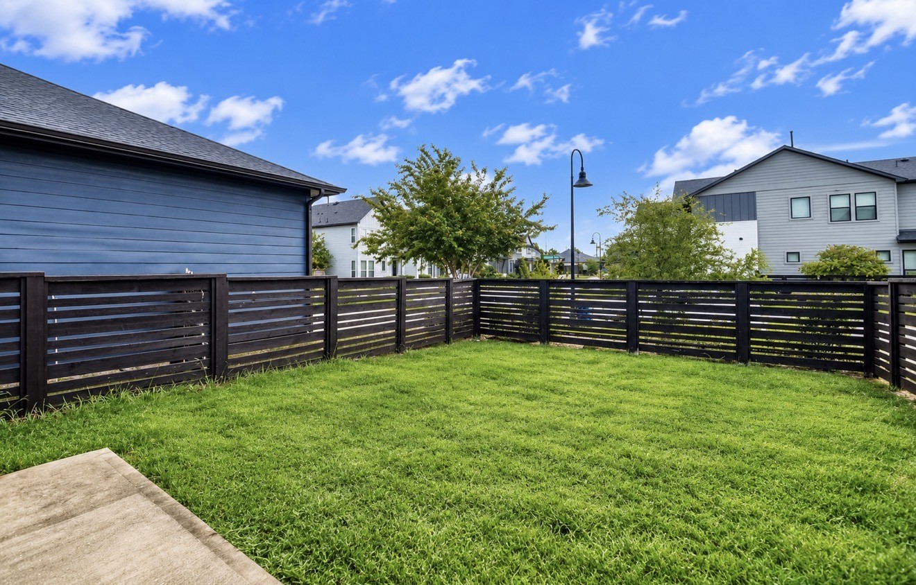 Fully fenced green space creates a private retreat while enjoying the amenities of the Bridgeland lifestyle.