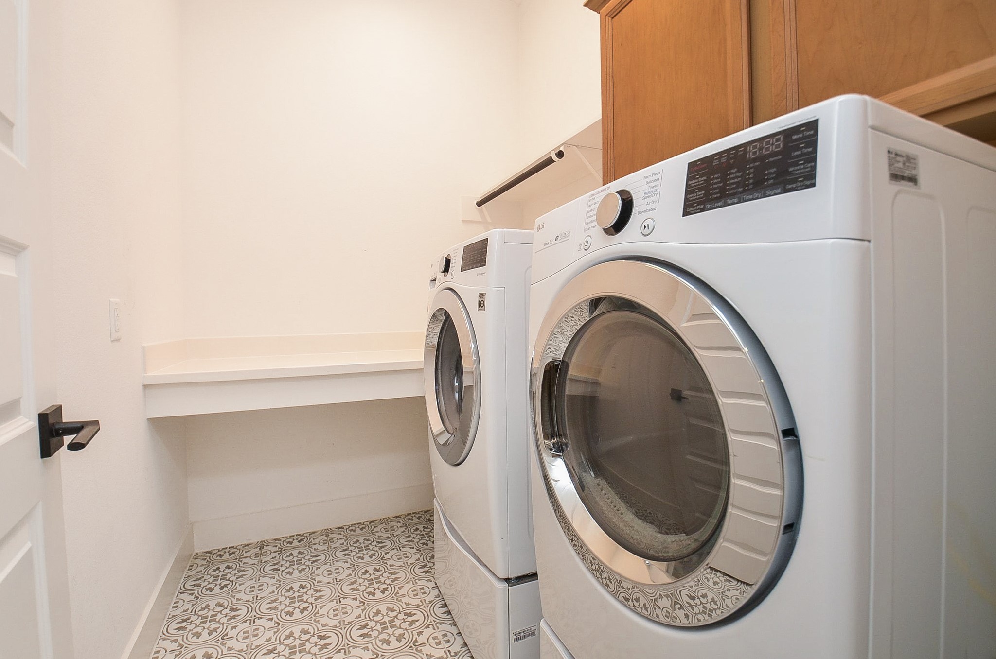 Dedicated laundry room provides convenient utility space for everyday household needs.