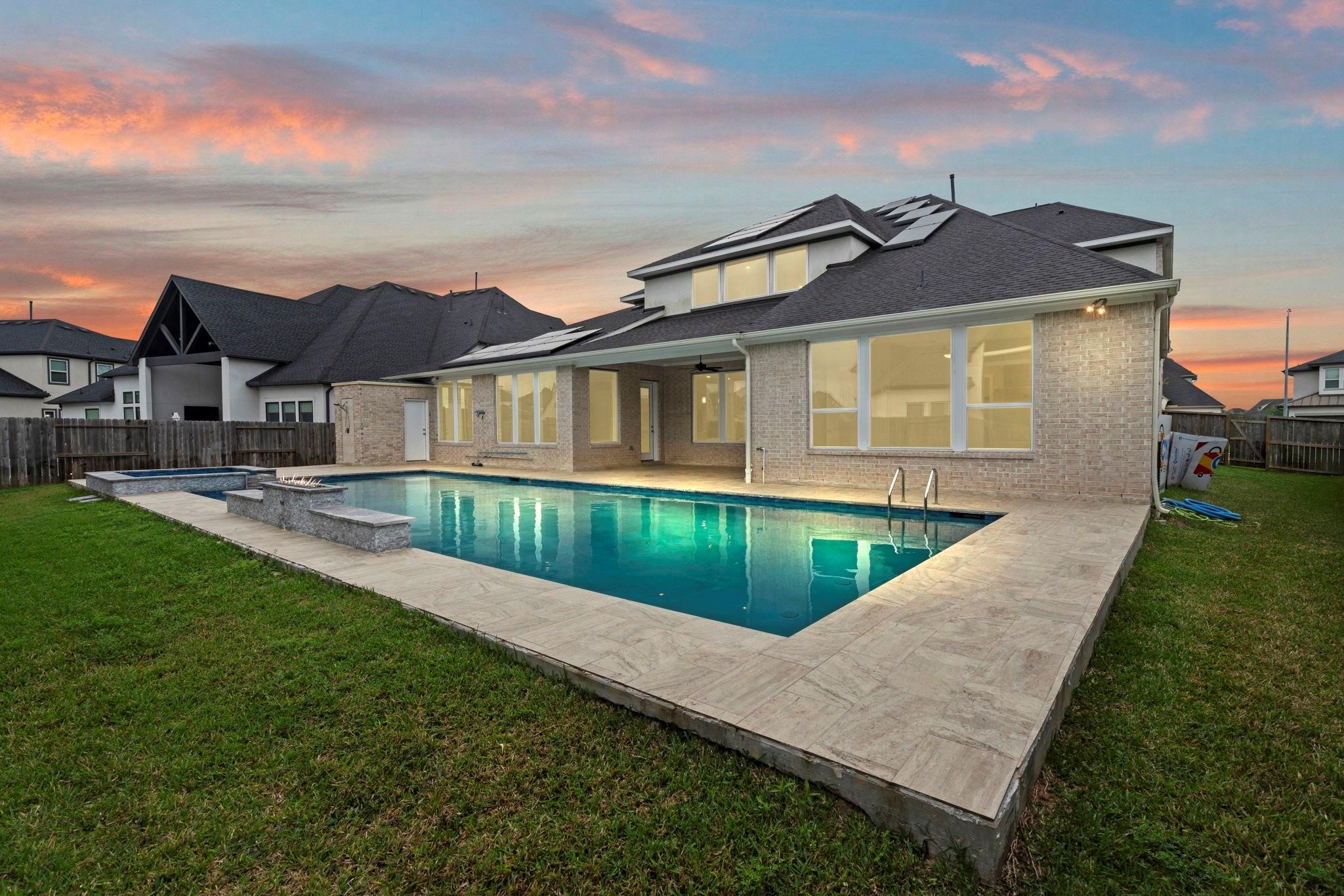 Beautiful backyard pool and spa with Water features and Fireplace