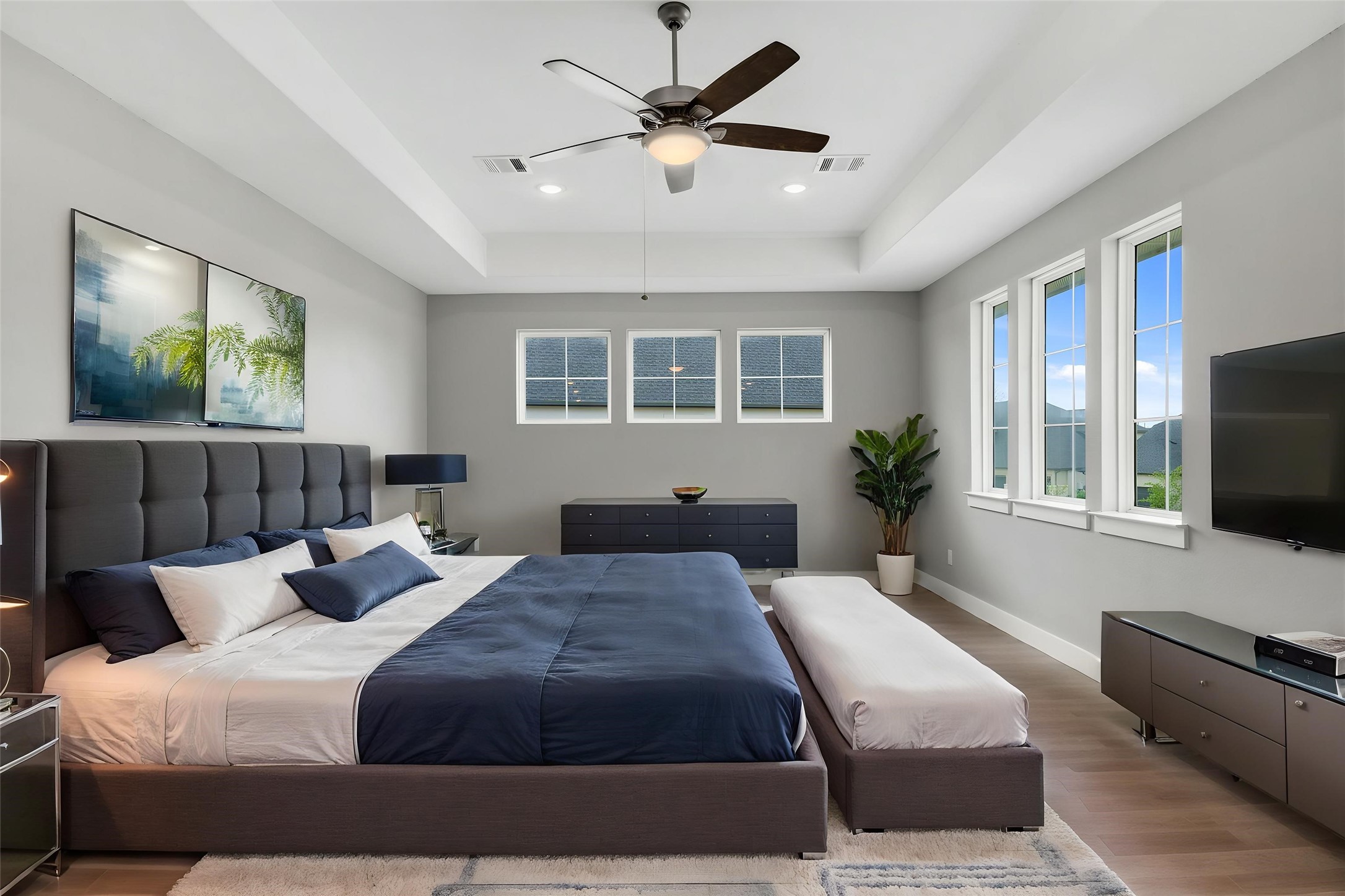 Bright third bedroom with generous space and natural light.