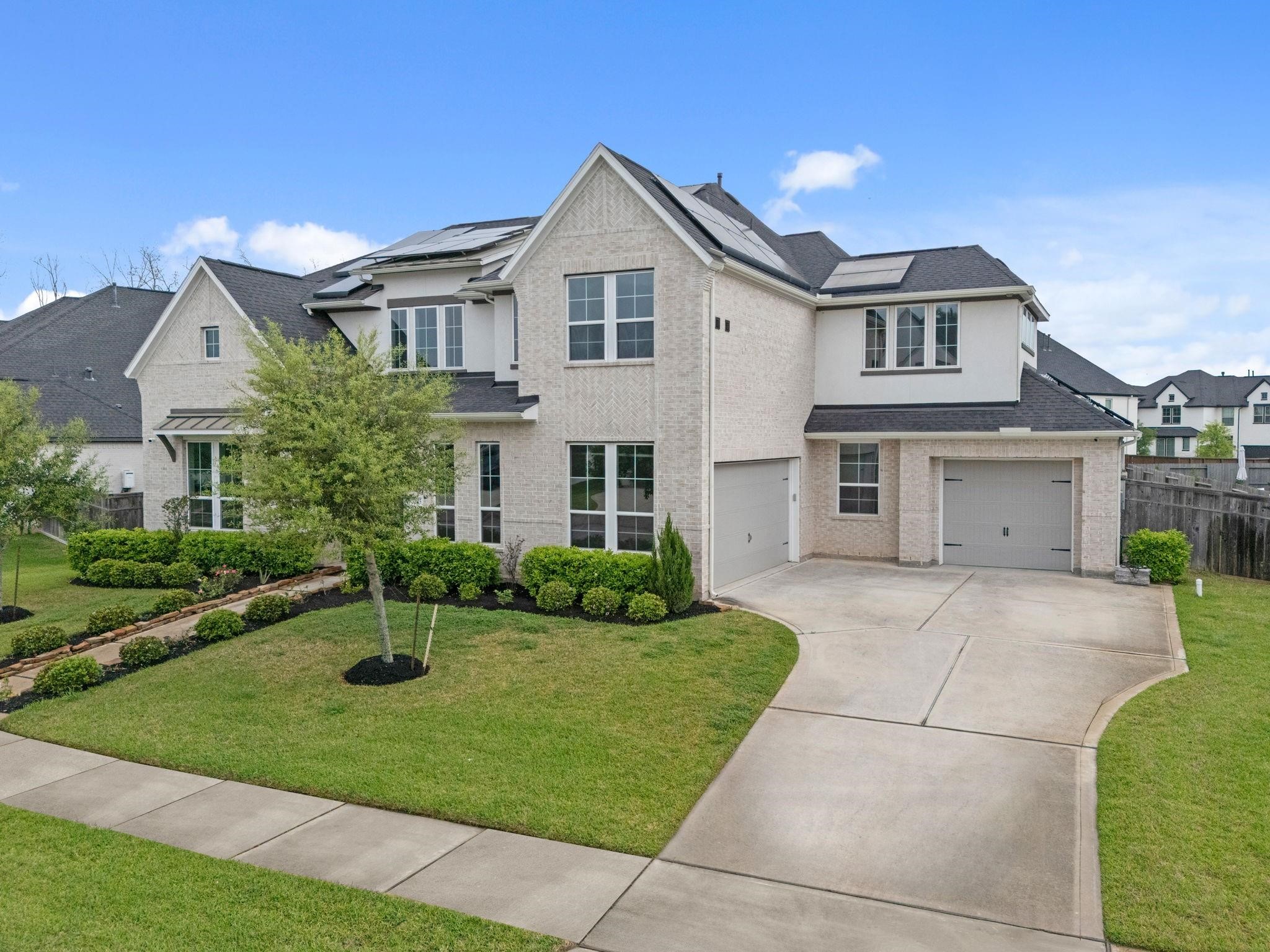 Impressive front exterior showcasing the home's grand architecture.