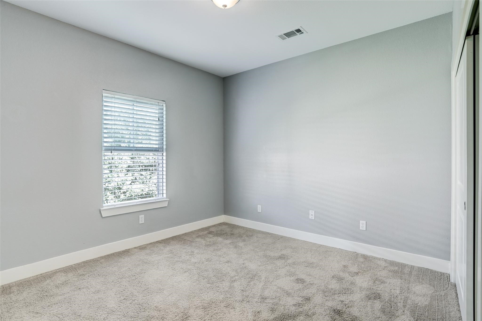 One of the secondary bedrooms